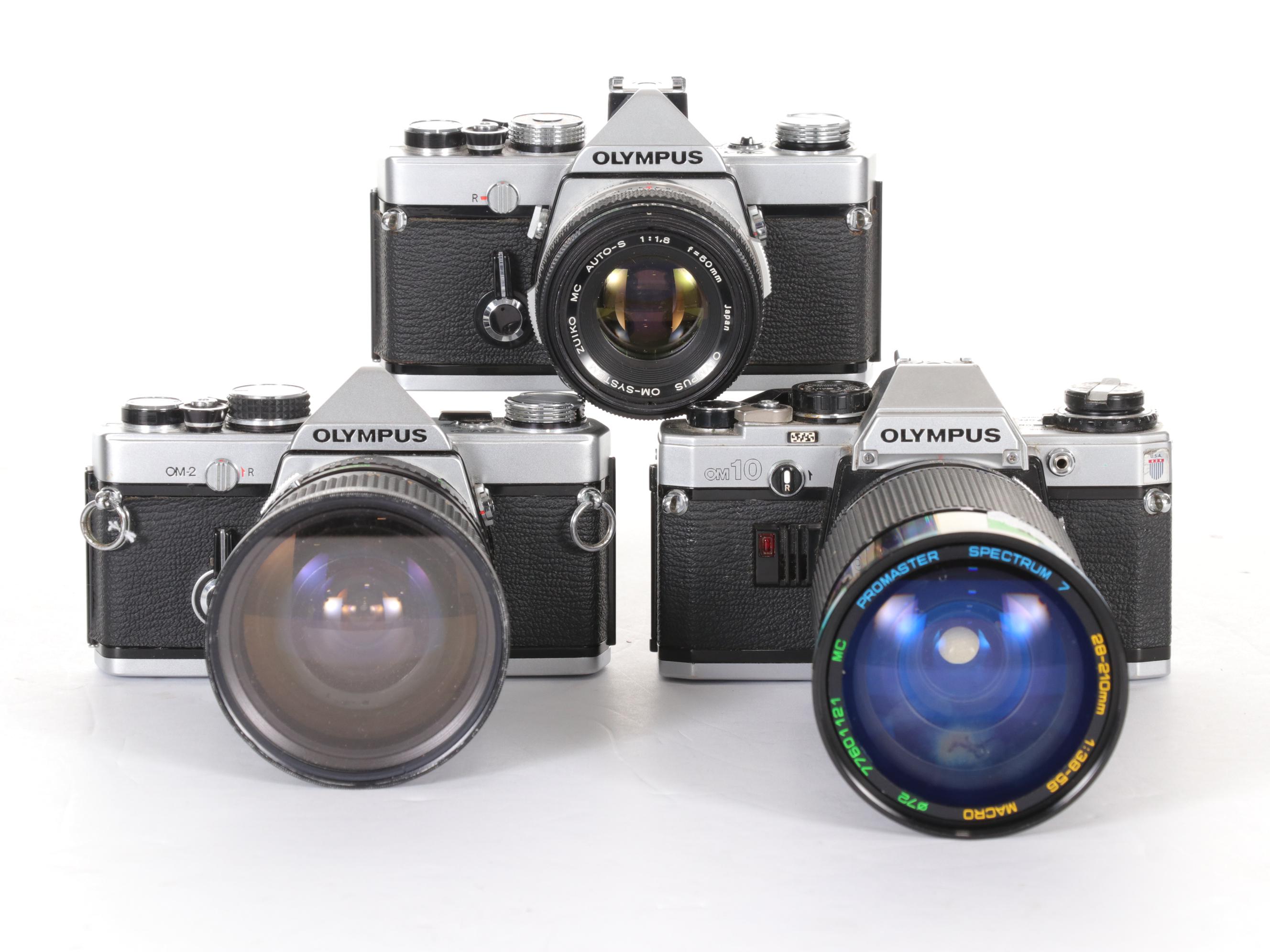 Olympus SLR Camera Bodies with Lenses and Other Accessories