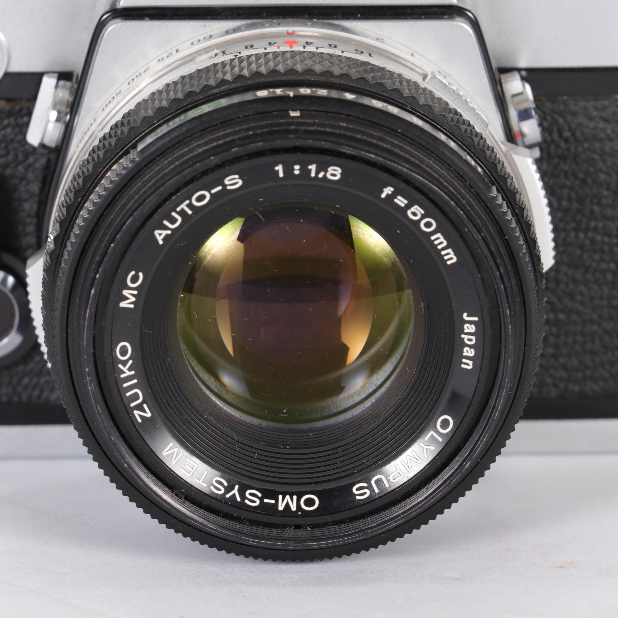 Olympus SLR Camera Bodies with Lenses and Other Accessories