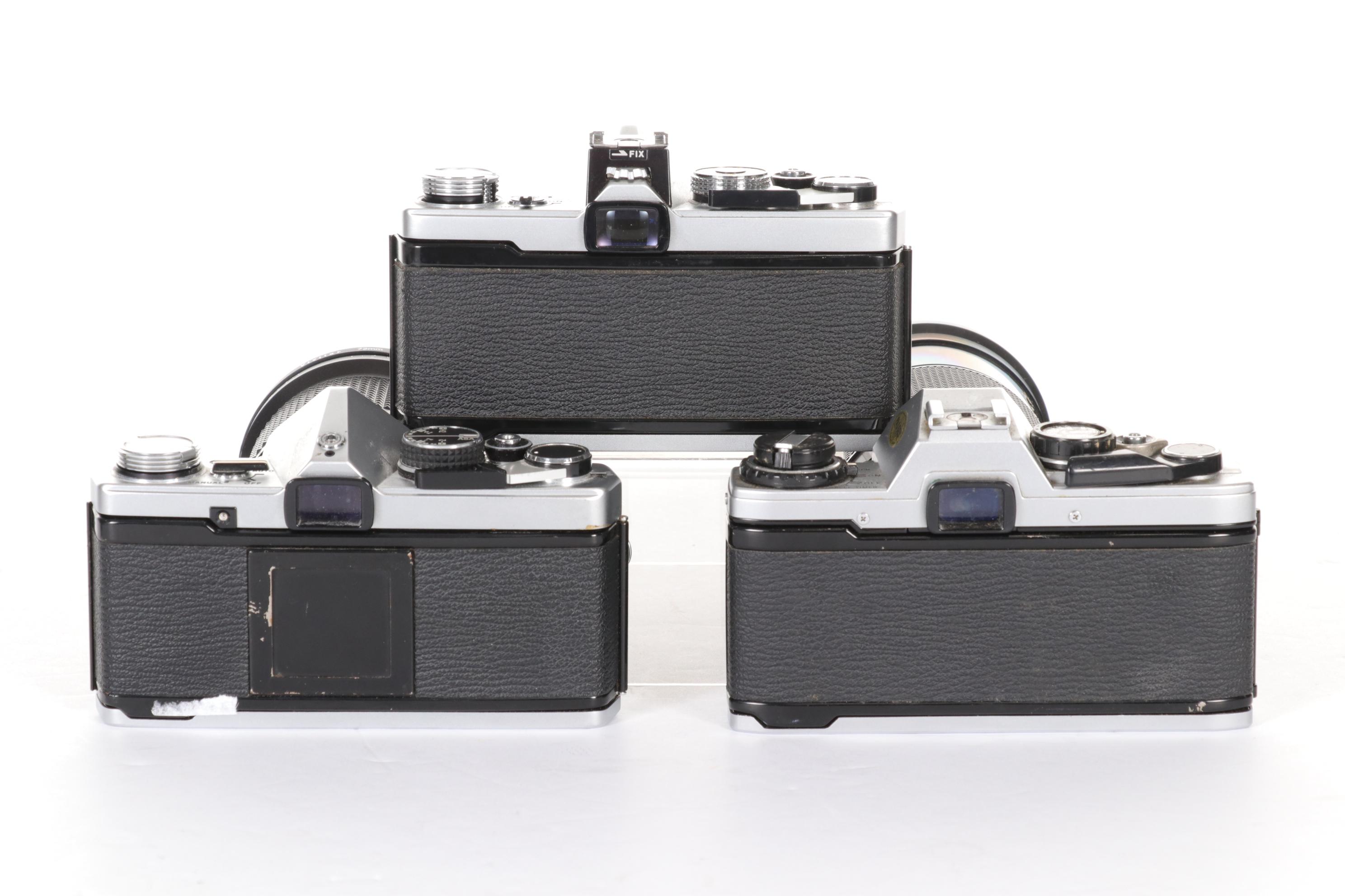 Olympus SLR Camera Bodies with Lenses and Other Accessories