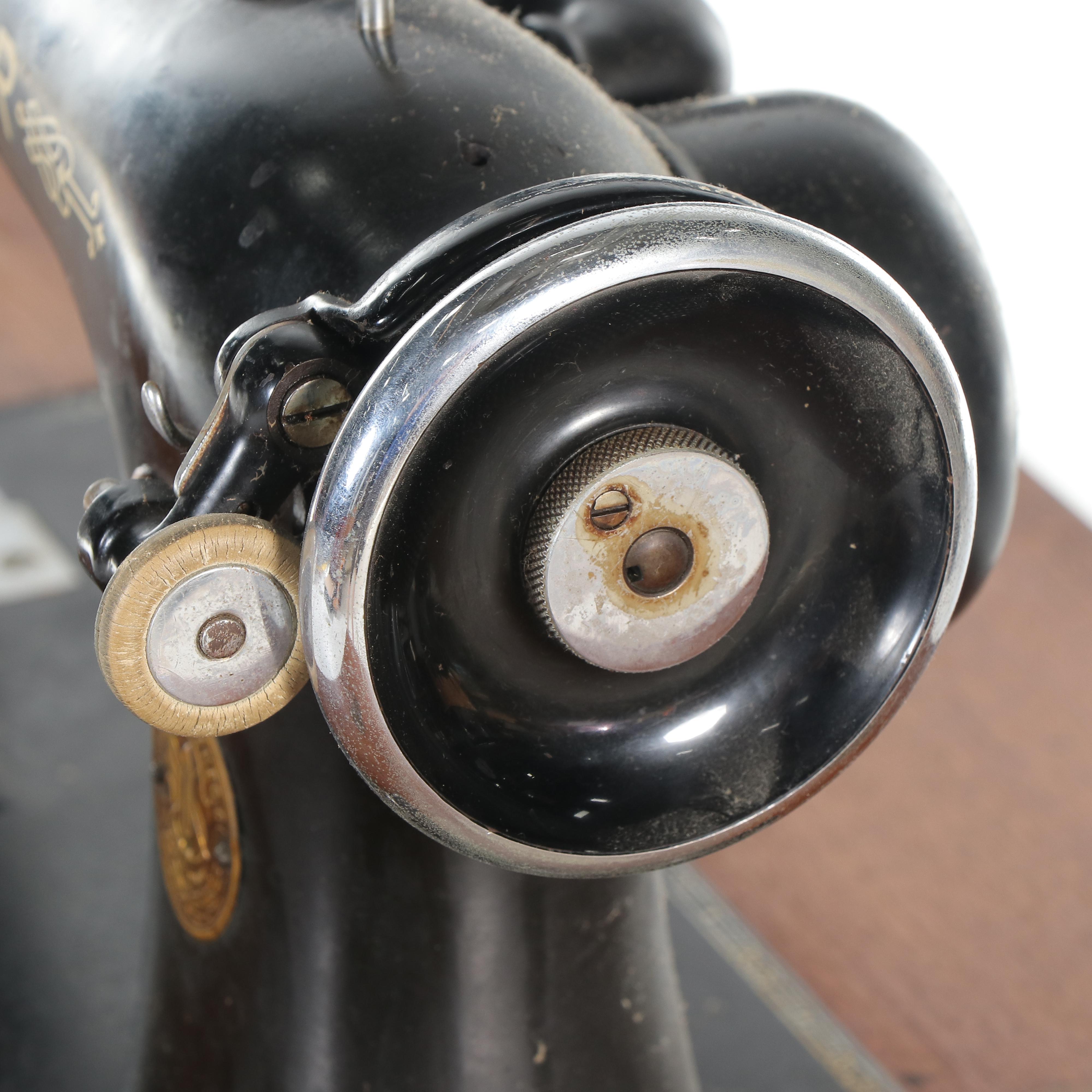 Singer Sewing Machine with Queen Anne Style Sewing Cabinet