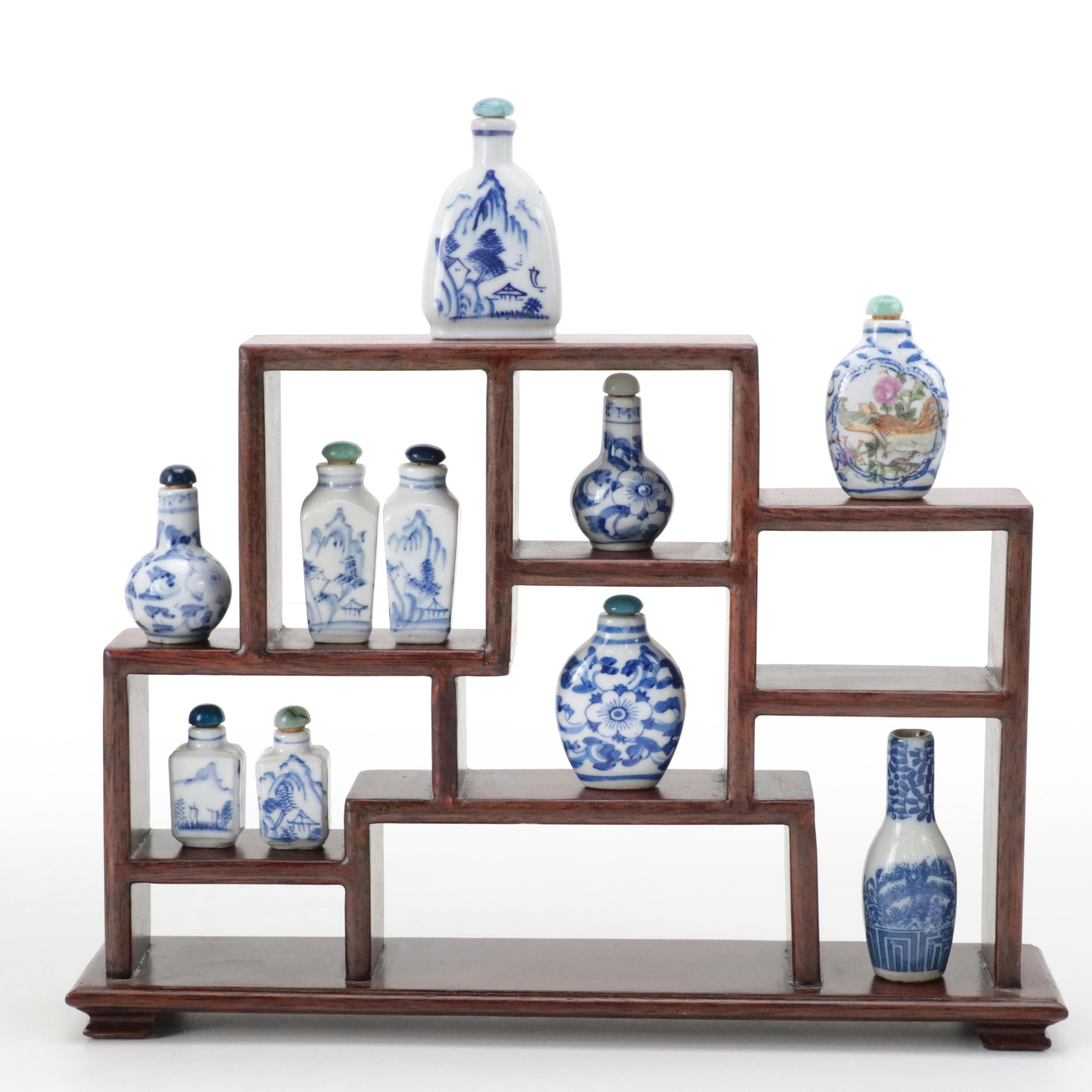 Chinese Porcelain Snuff Bottles on Wooden Display Shelf