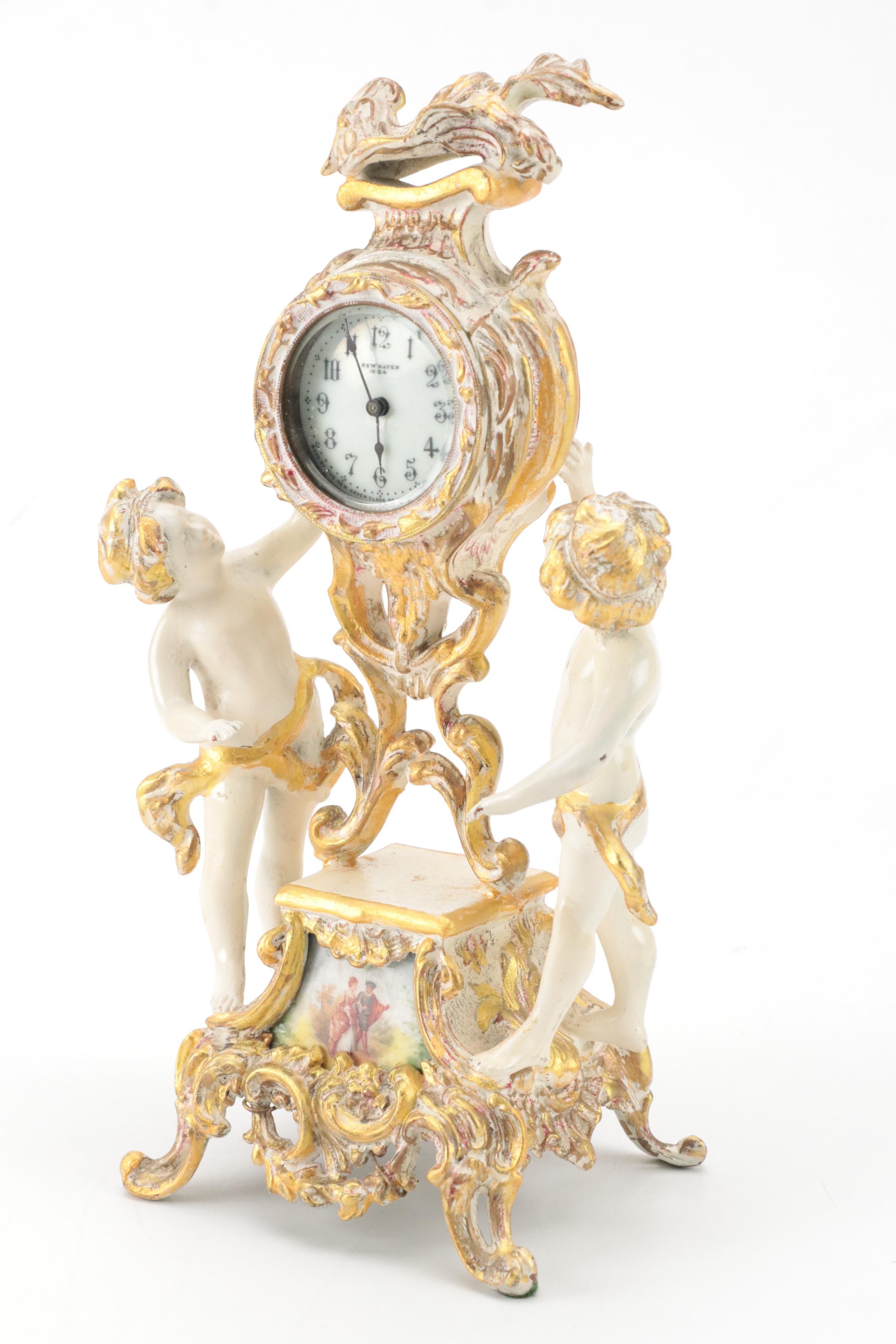 New Haven Clock Co. Painted Brass Mantel Clock with Putti Figures