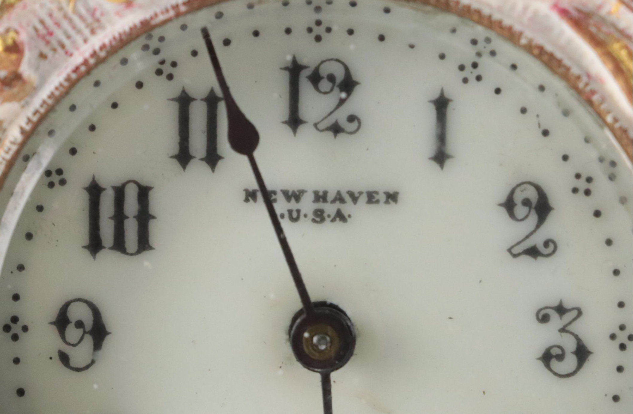 New Haven Clock Co. Painted Brass Mantel Clock with Putti Figures