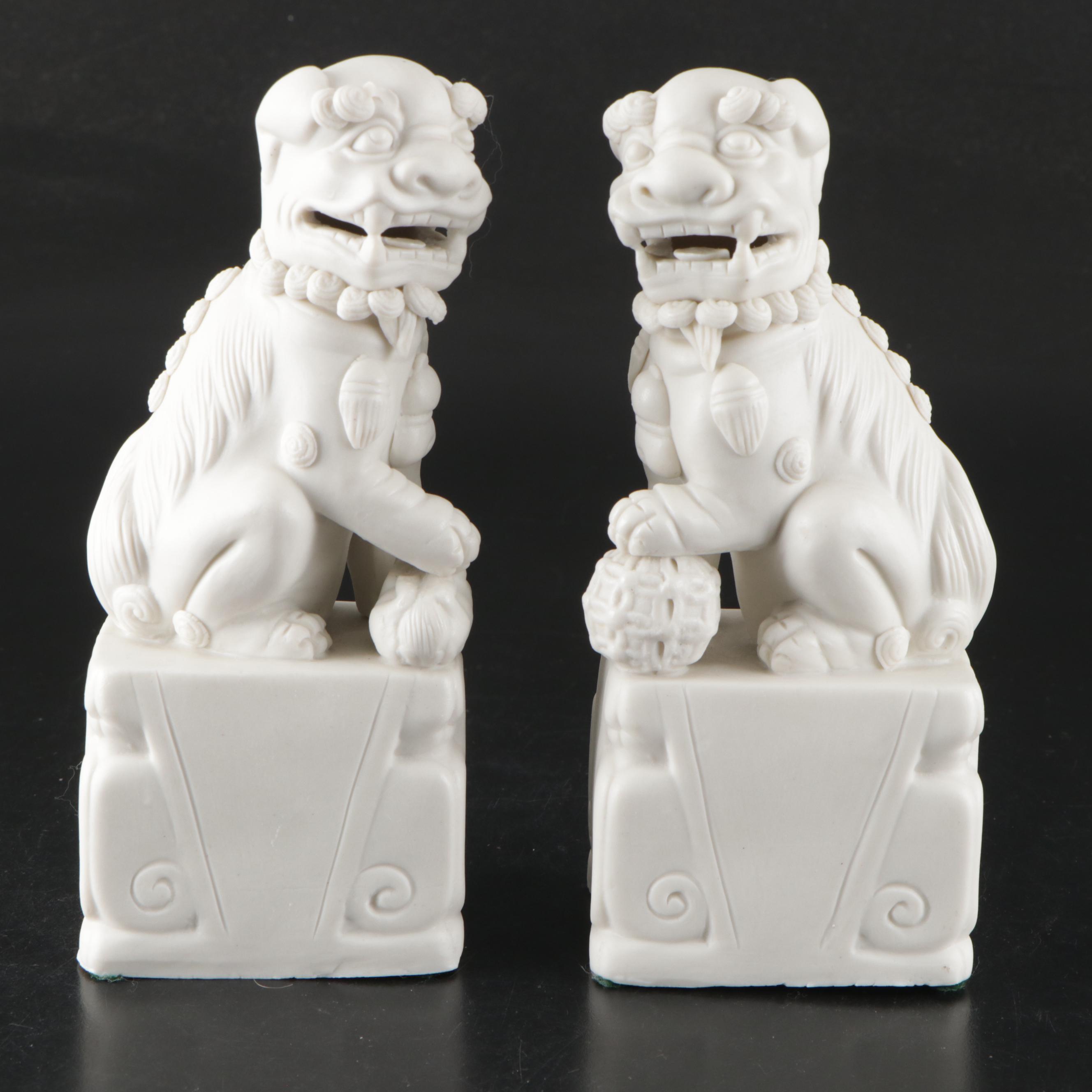 Chinese Porcelain Guardian Lion Figurine Pair