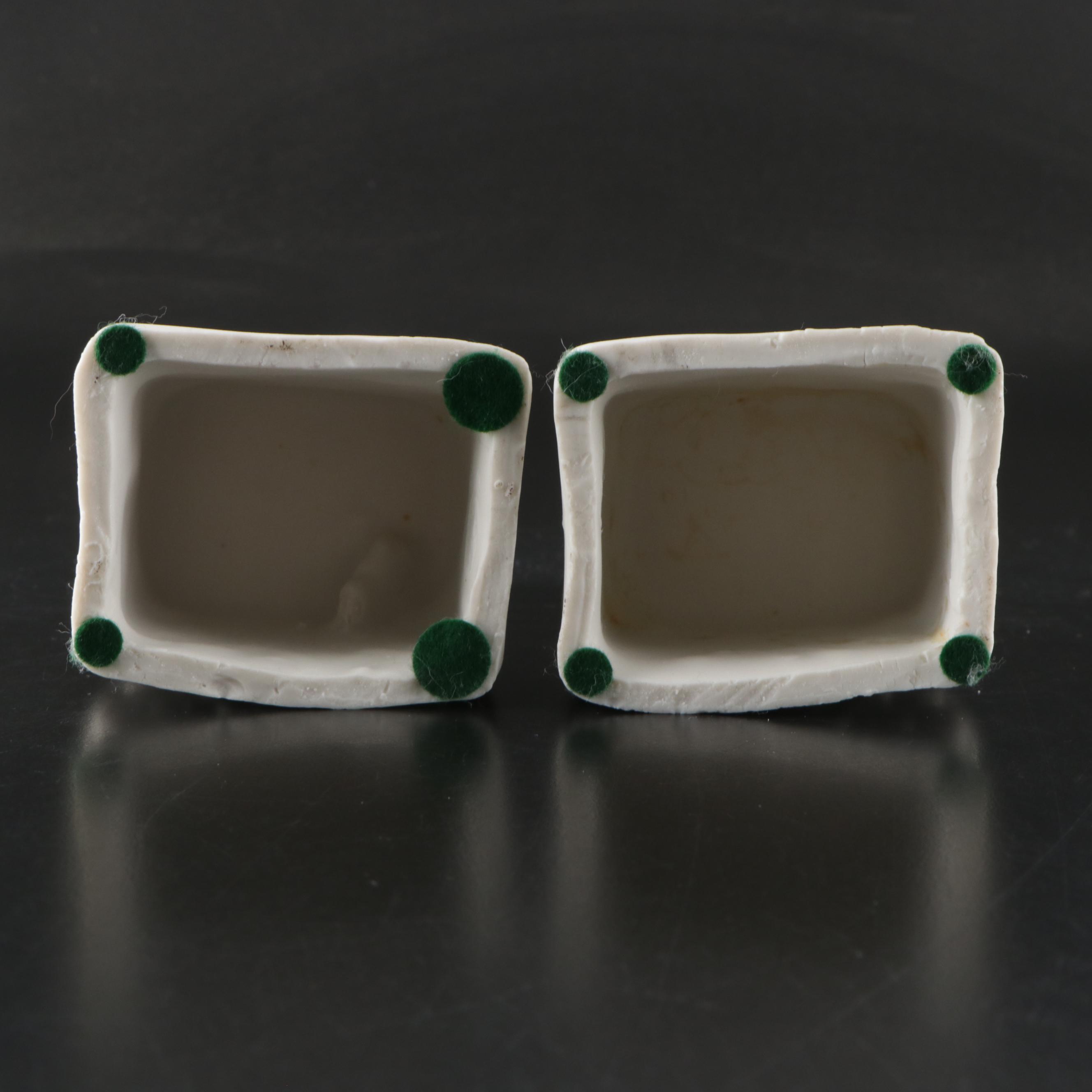 Chinese Porcelain Guardian Lion Figurine Pair