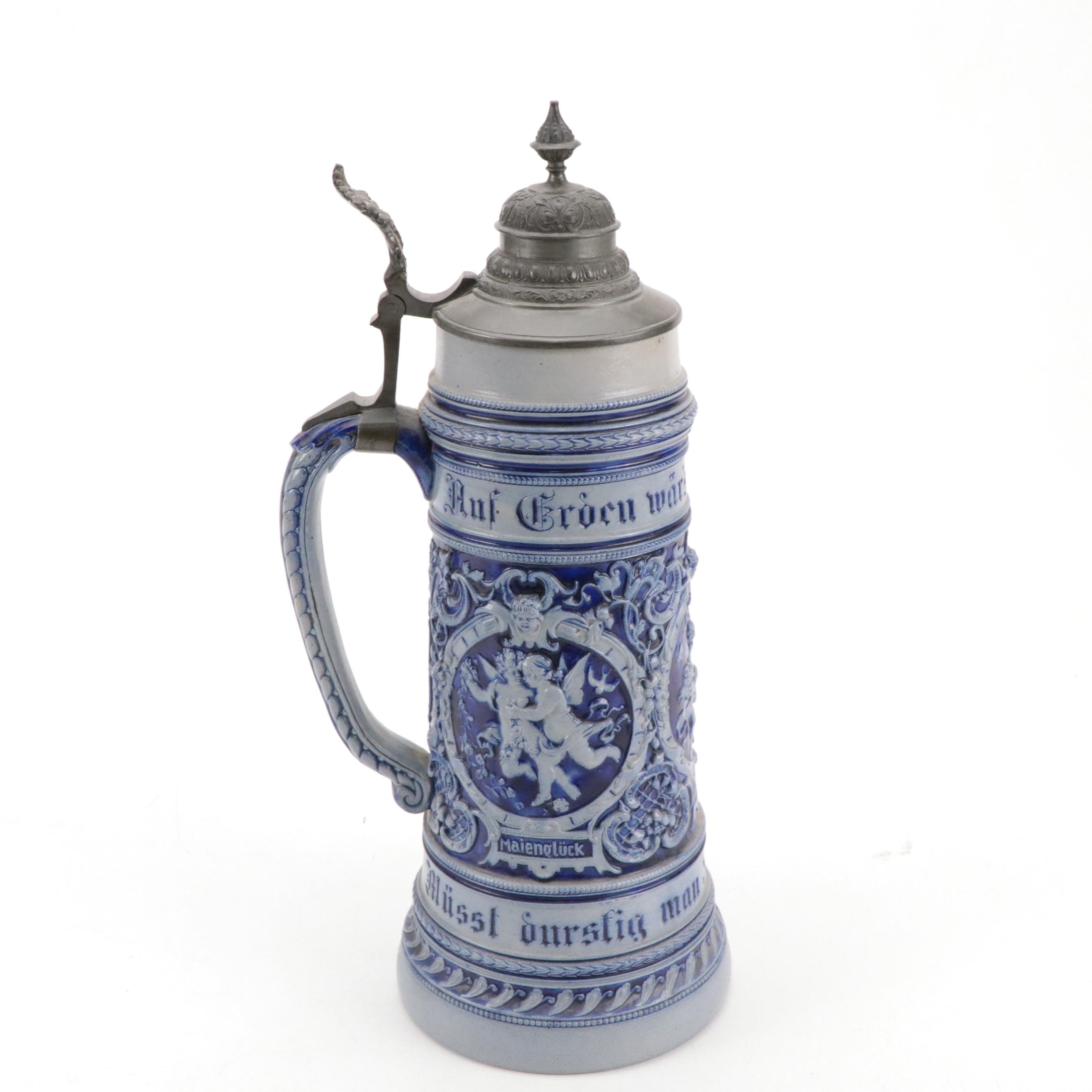 German Stoneware Beer Steins and Other Pitcher