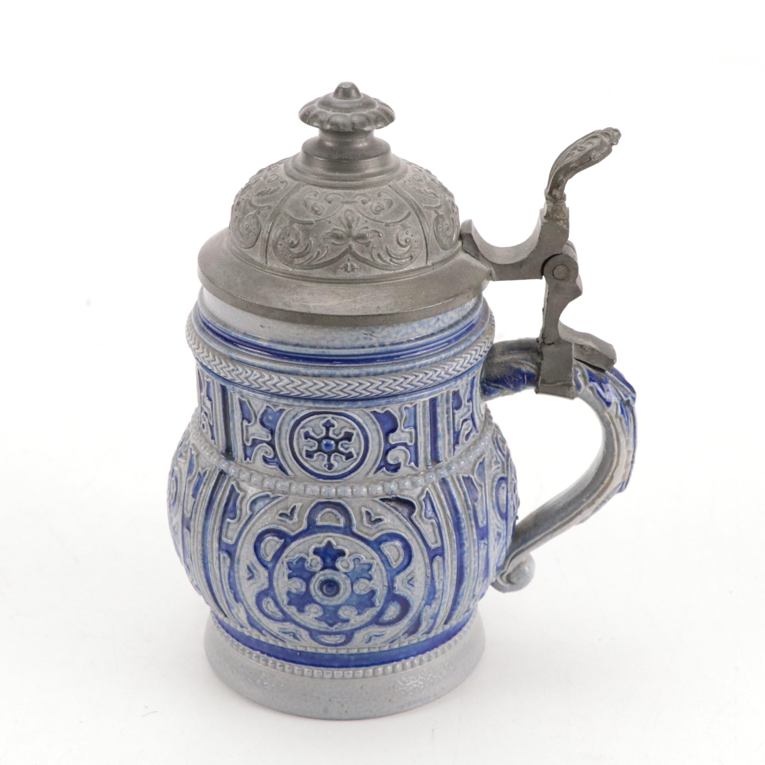 German Stoneware Beer Steins and Other Pitcher