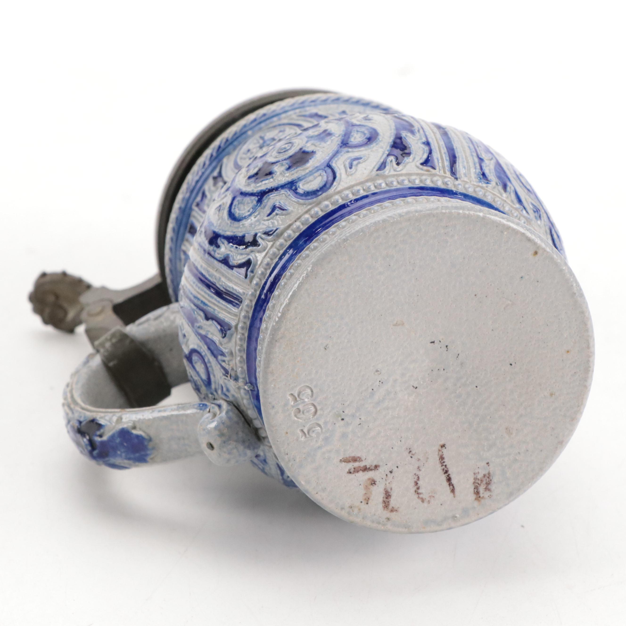 German Stoneware Beer Steins and Other Pitcher