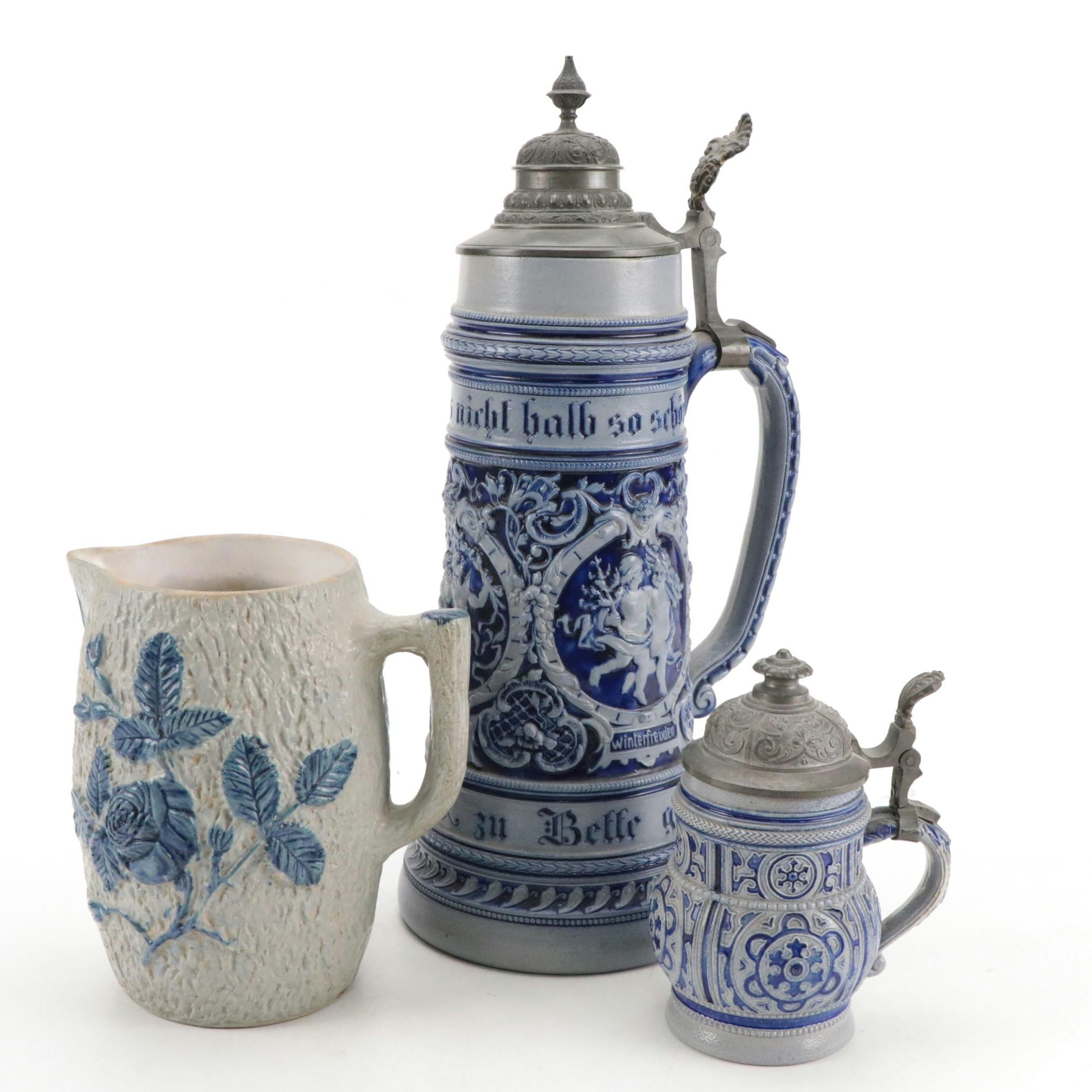 German Stoneware Beer Steins and Other Pitcher