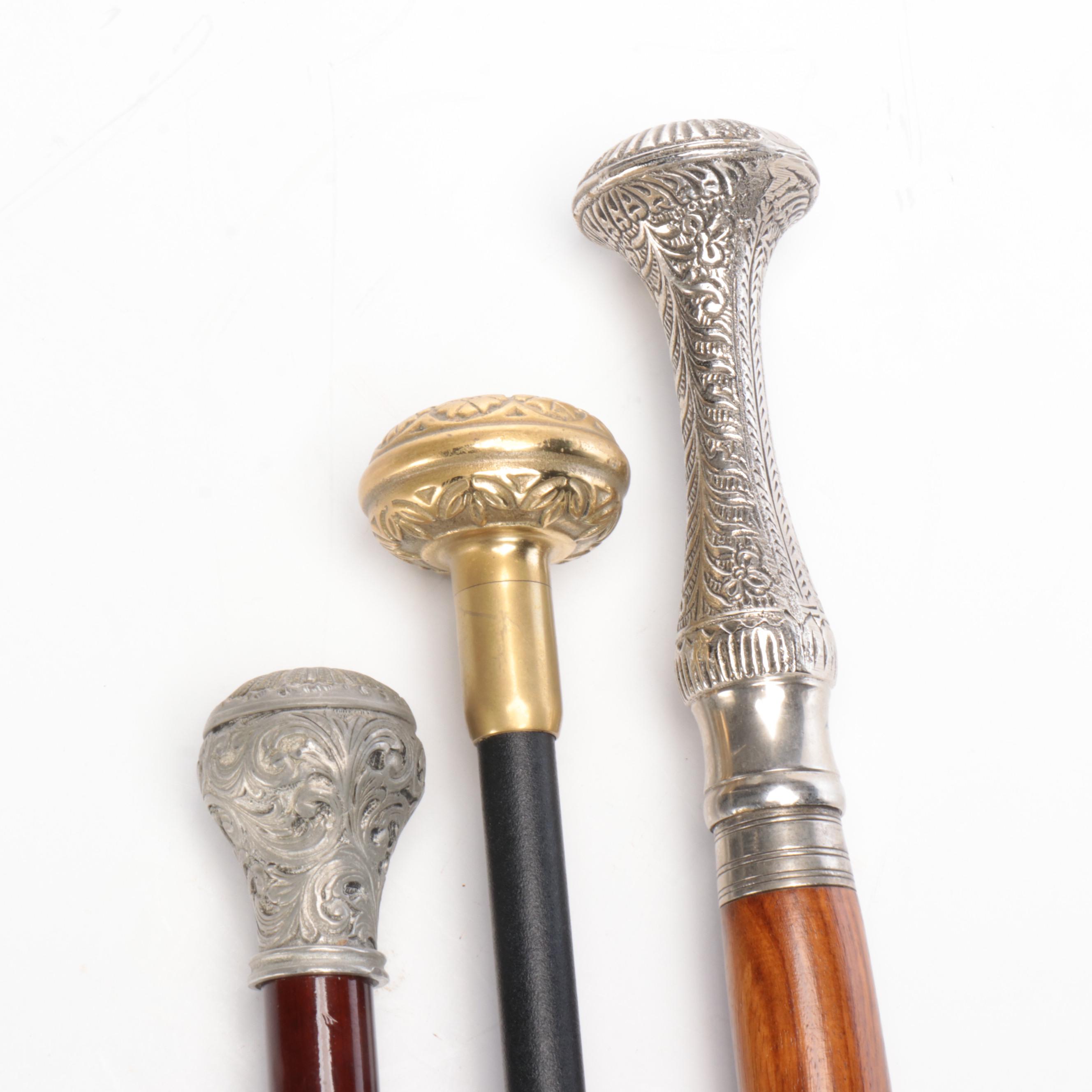 Bridges Cast Brass and Wood Walking Cane with Other Canes