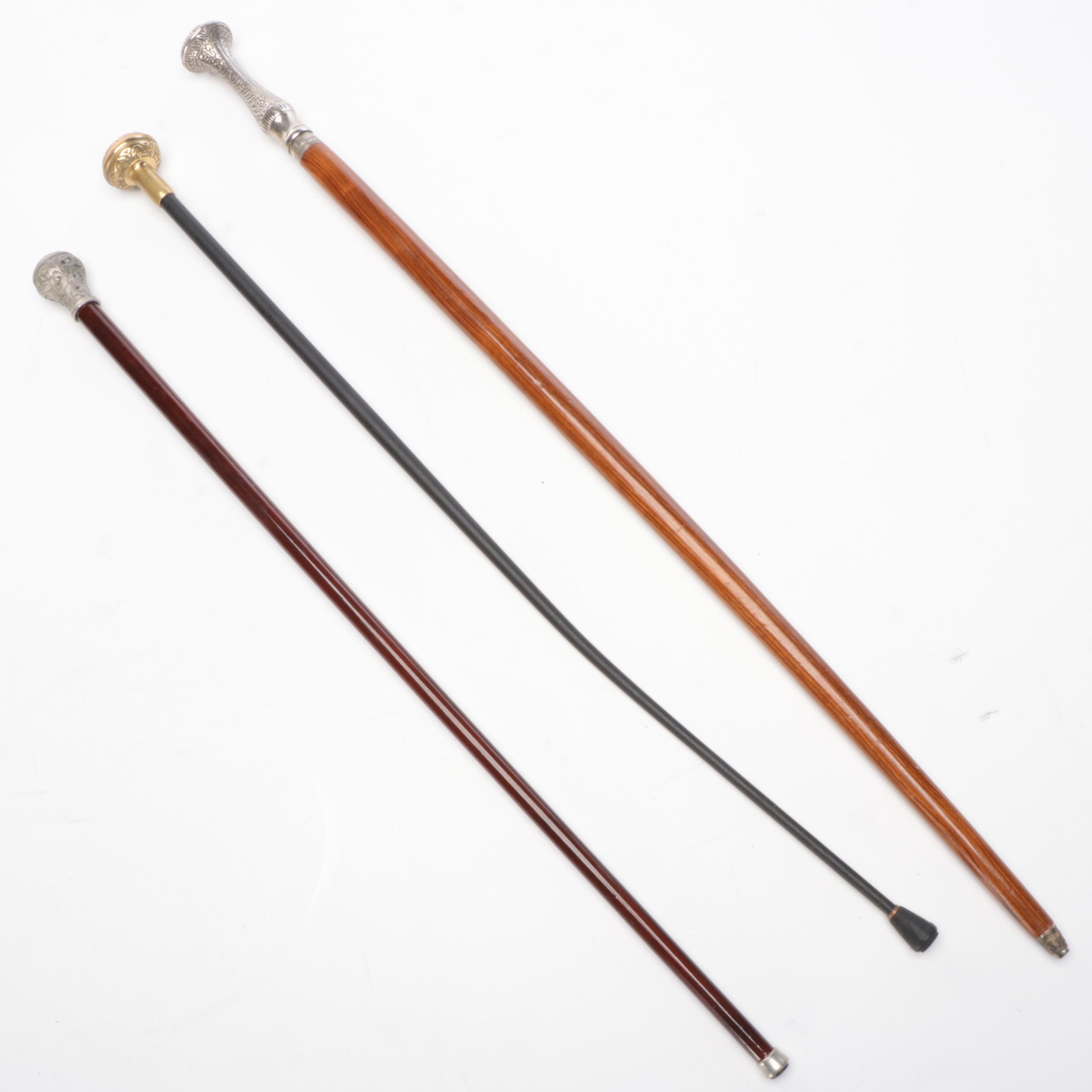 Bridges Cast Brass and Wood Walking Cane with Other Canes