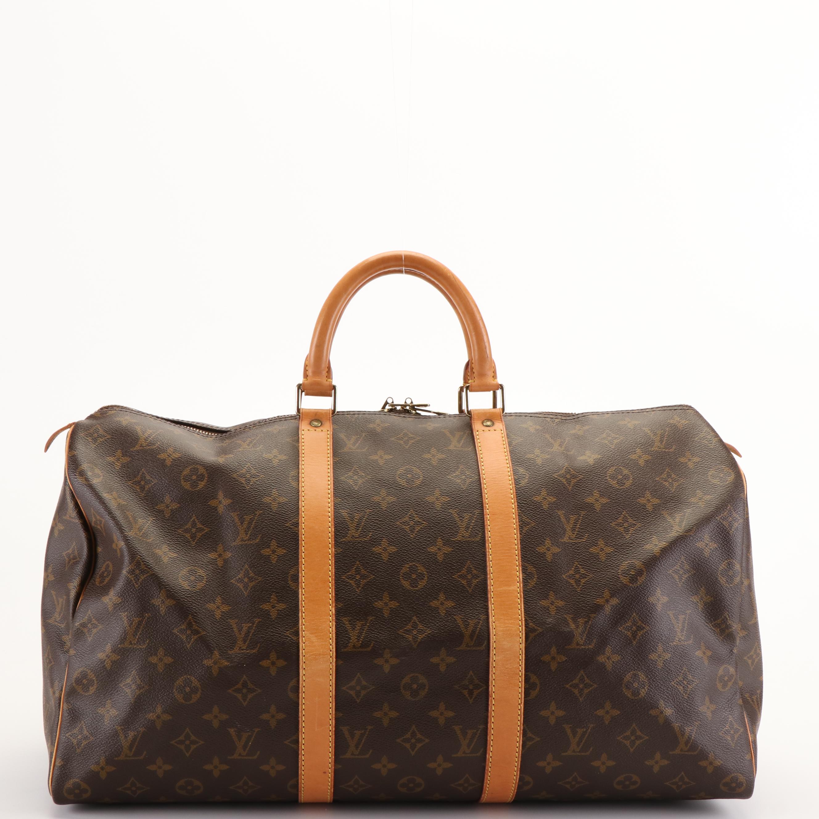Louis Vuitton Keepall 55 Travel Bag in Monogram Canvas and Leather