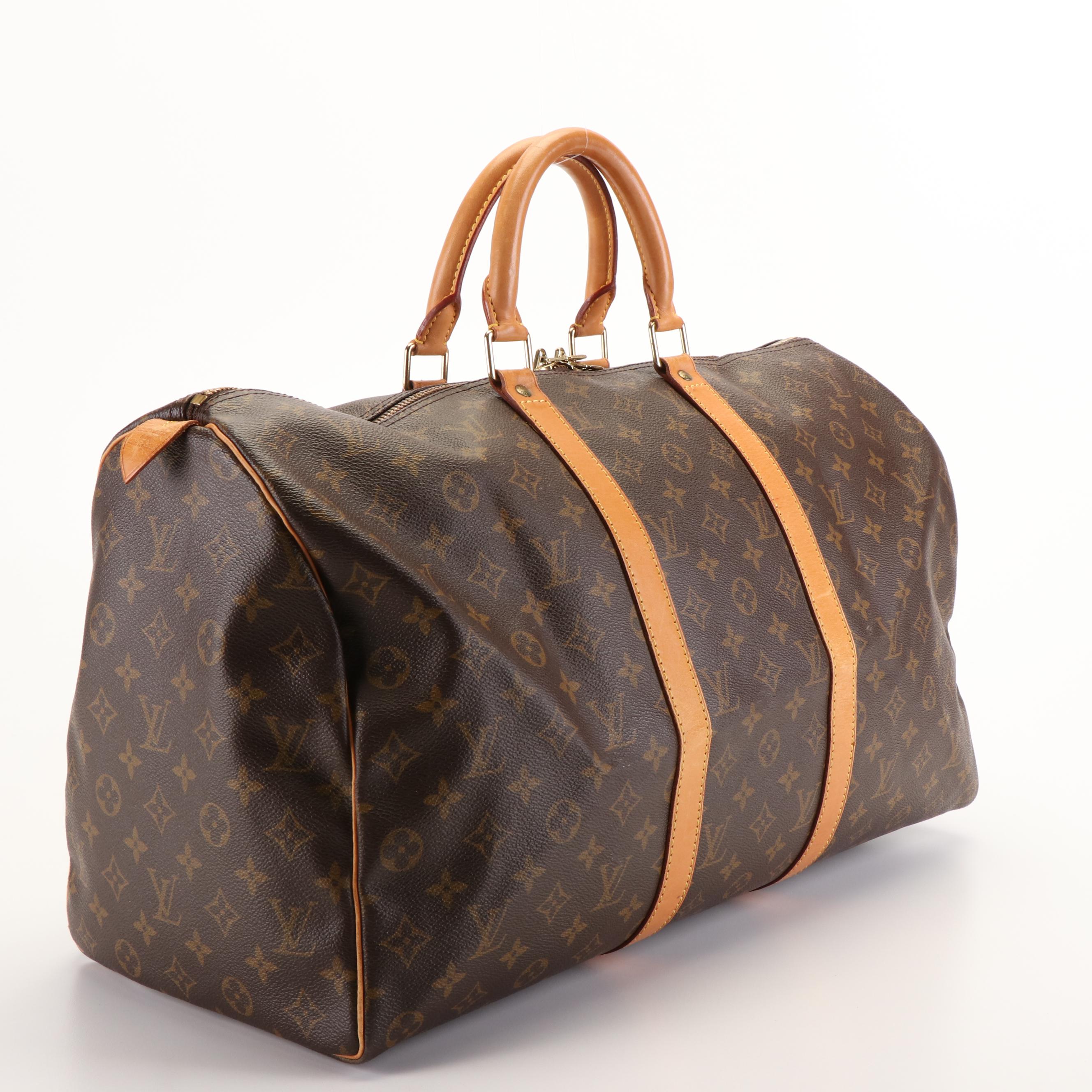 Louis Vuitton Keepall 55 Travel Bag in Monogram Canvas and Leather