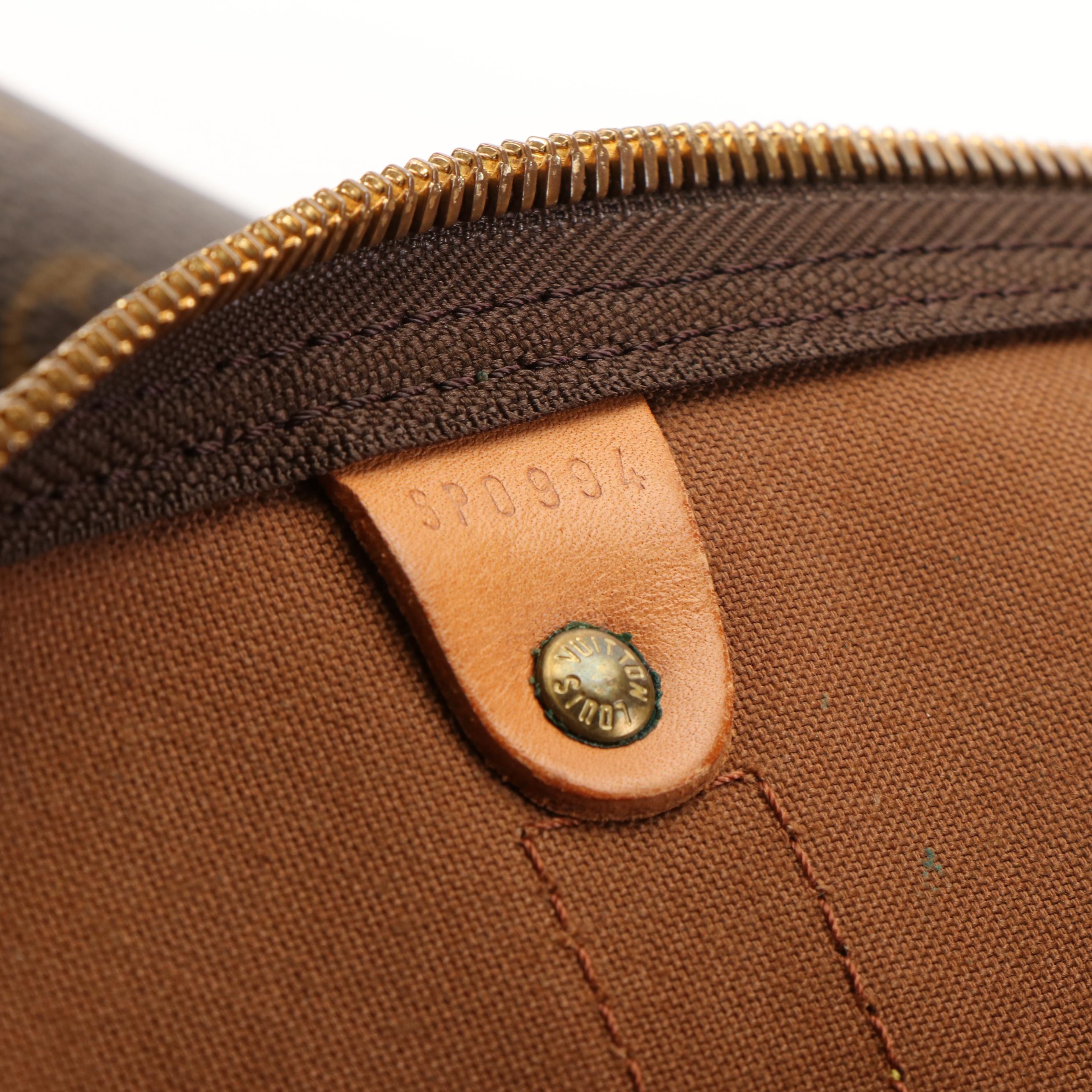 Louis Vuitton Keepall 55 Travel Bag in Monogram Canvas and Leather