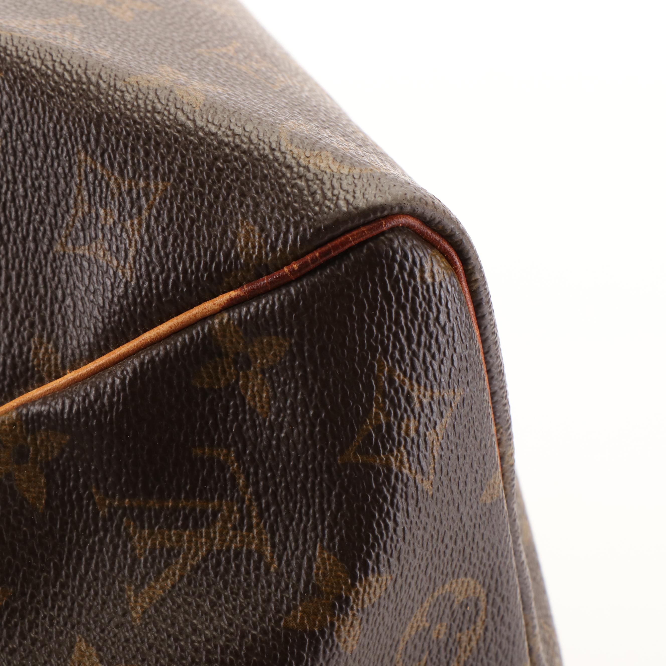 Louis Vuitton Keepall 55 Travel Bag in Monogram Canvas and Leather