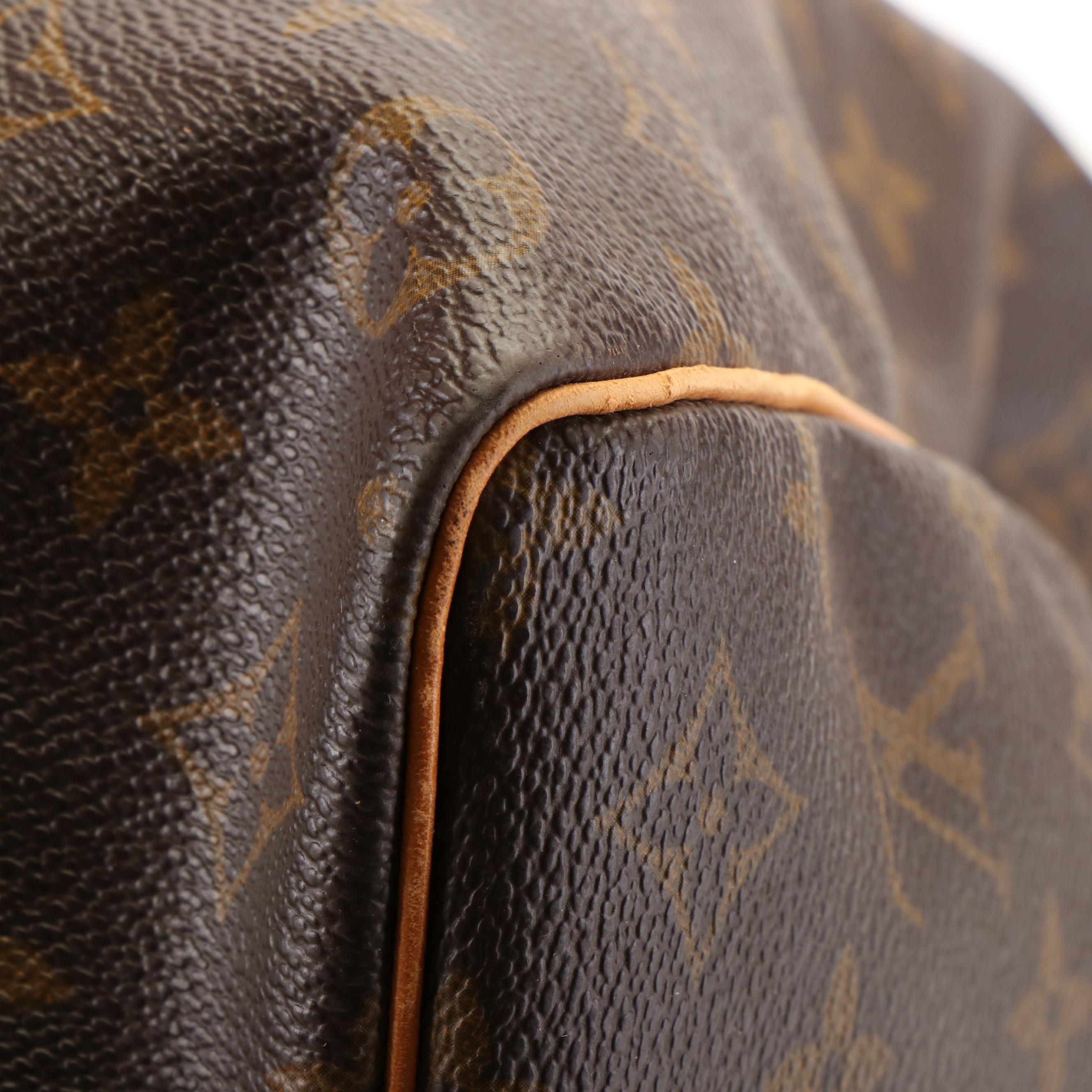 Louis Vuitton Keepall 55 Travel Bag in Monogram Canvas and Leather