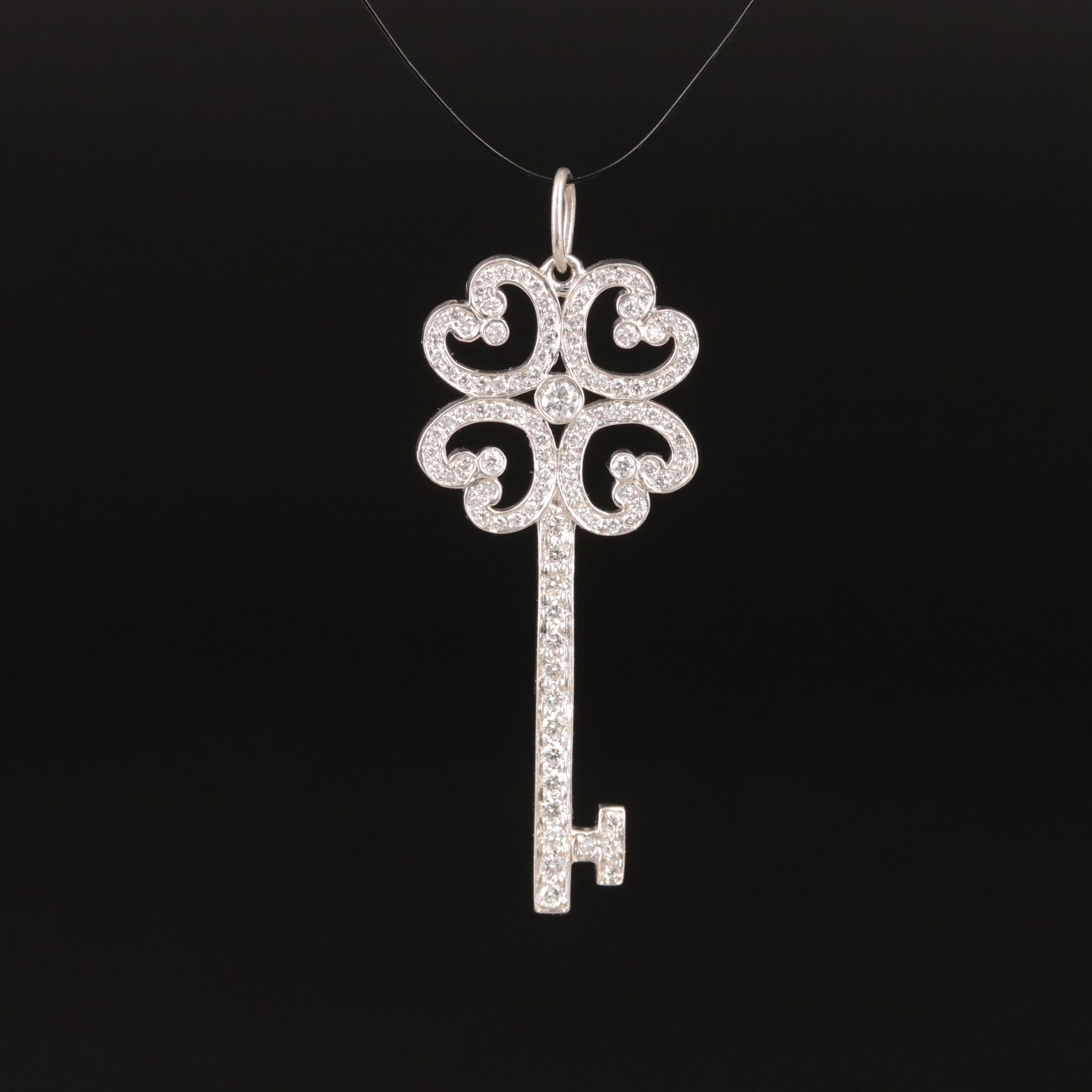 Tiffany & Co. Enchant Platinum 0.44 CTW Diamond Quatra Heart Key Pendant