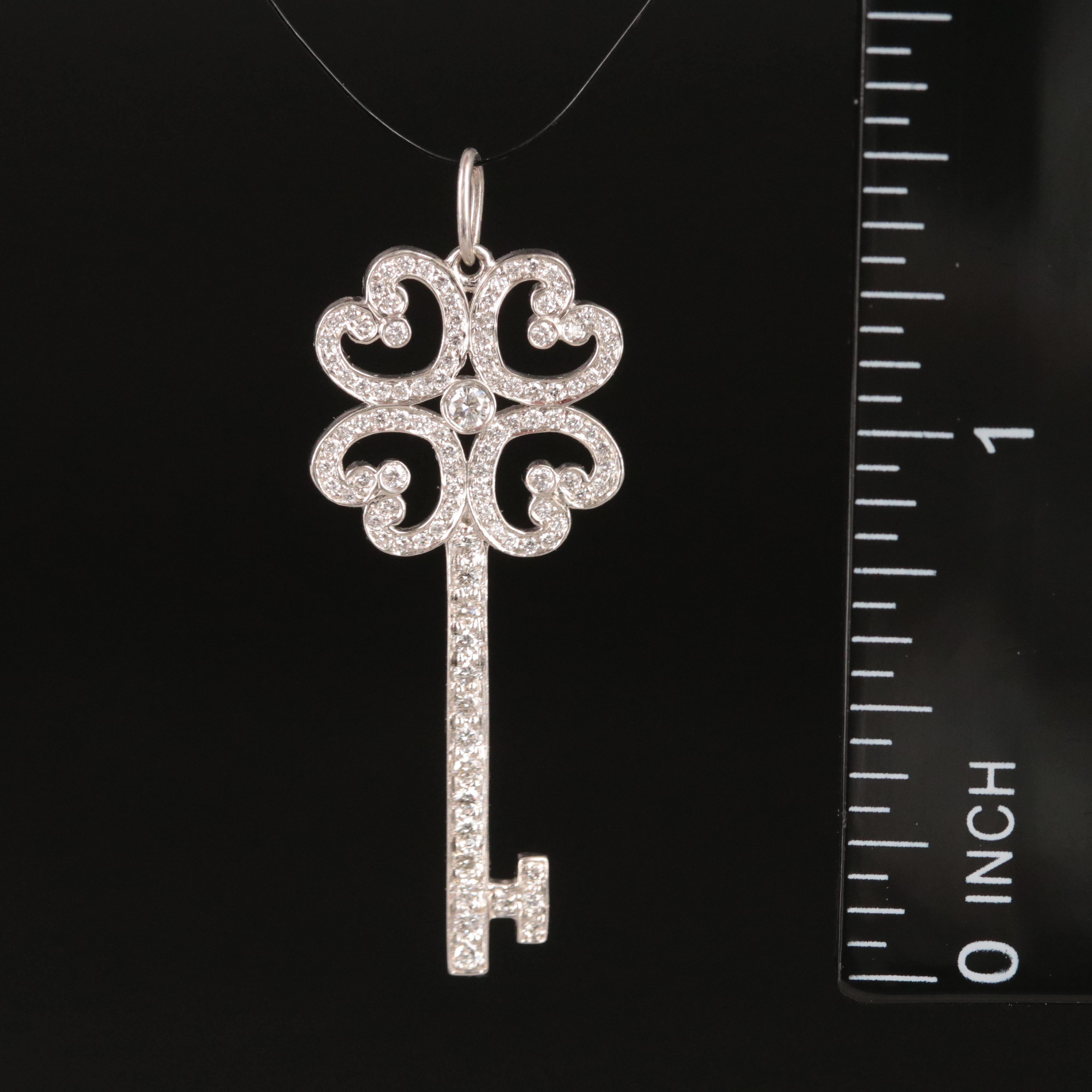 Tiffany & Co. Enchant Platinum 0.44 CTW Diamond Quatra Heart Key Pendant