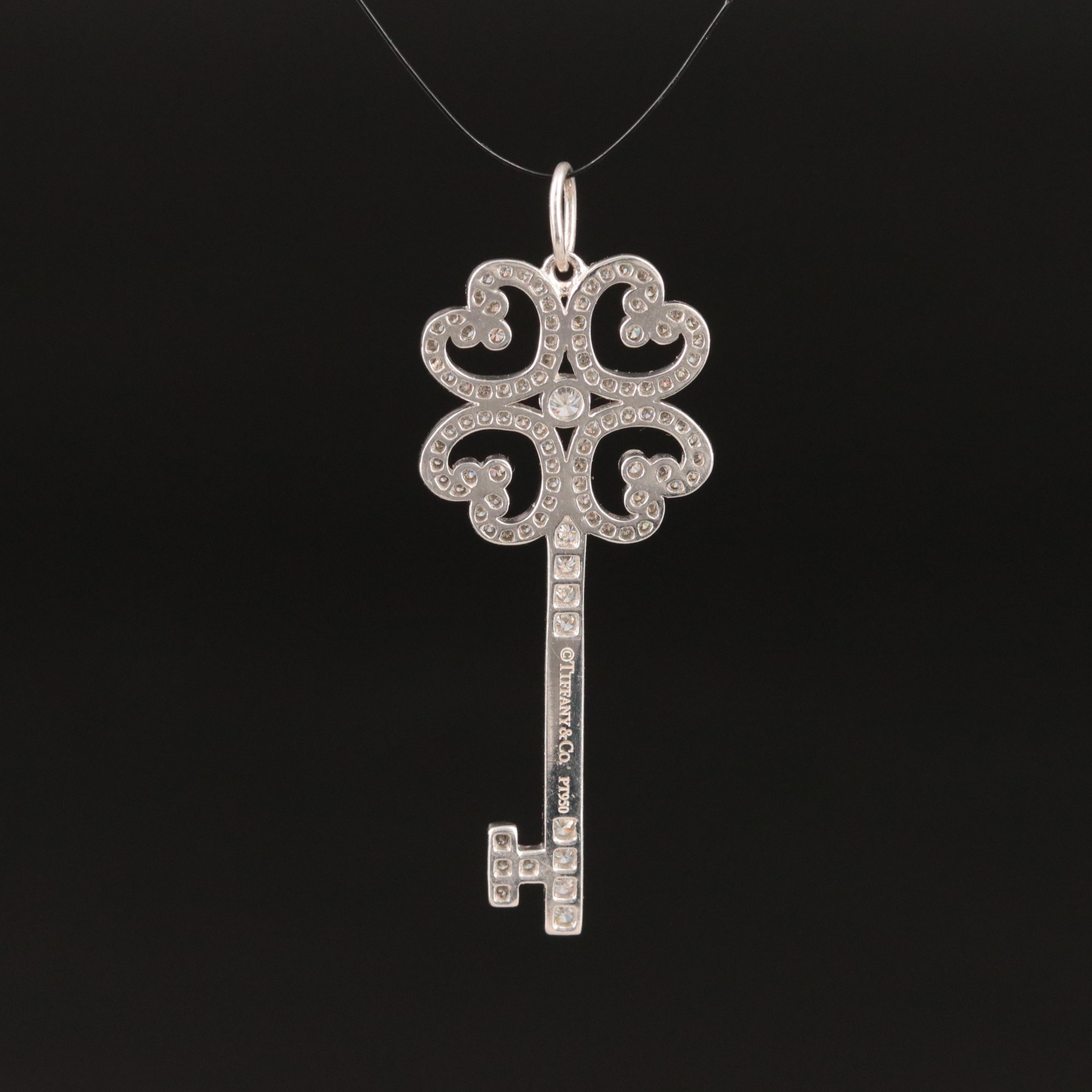 Tiffany & Co. Enchant Platinum 0.44 CTW Diamond Quatra Heart Key Pendant