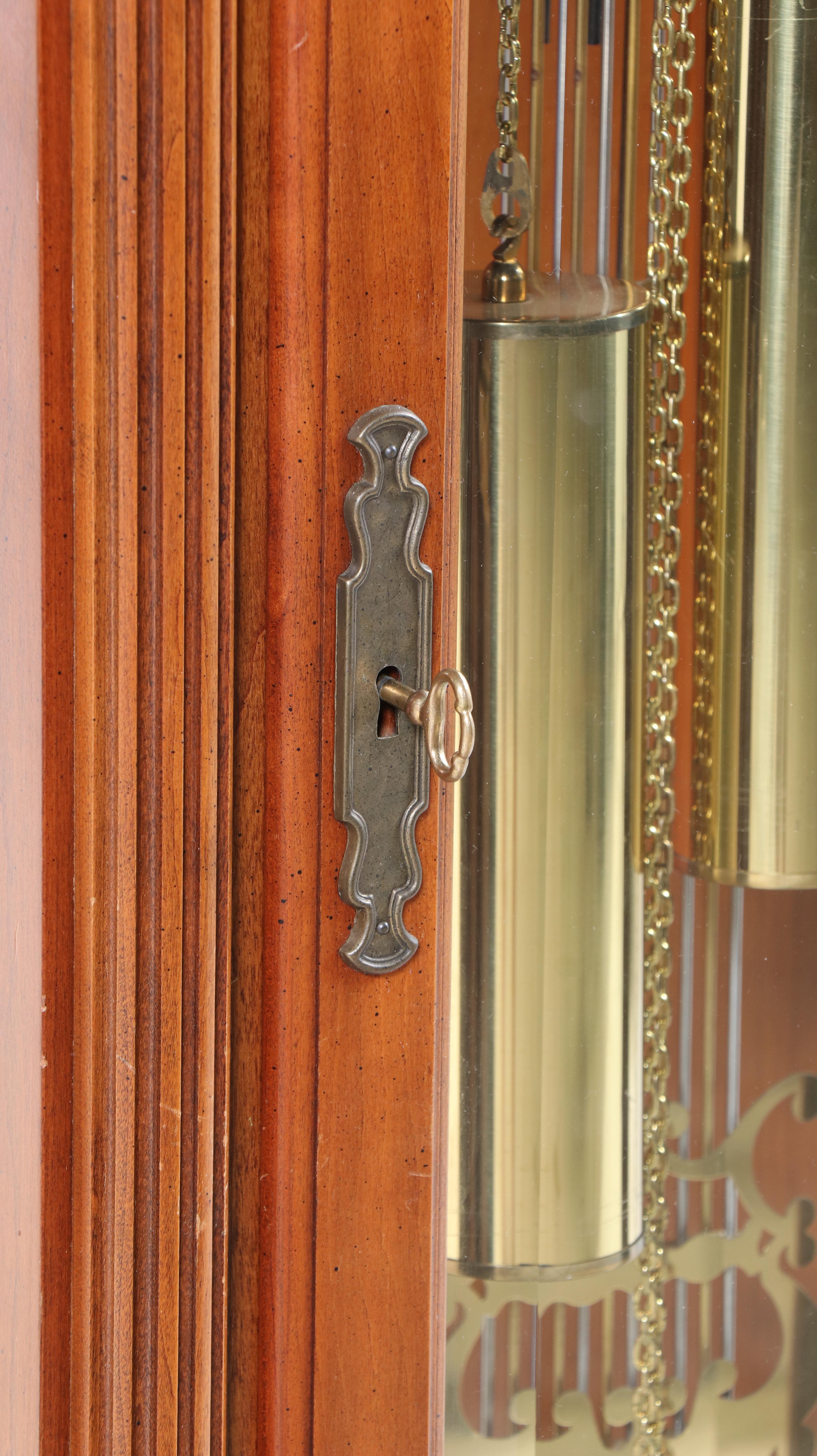 Howard Miller Bookmatched Veneer Wood Pendulum Grandfather Clock