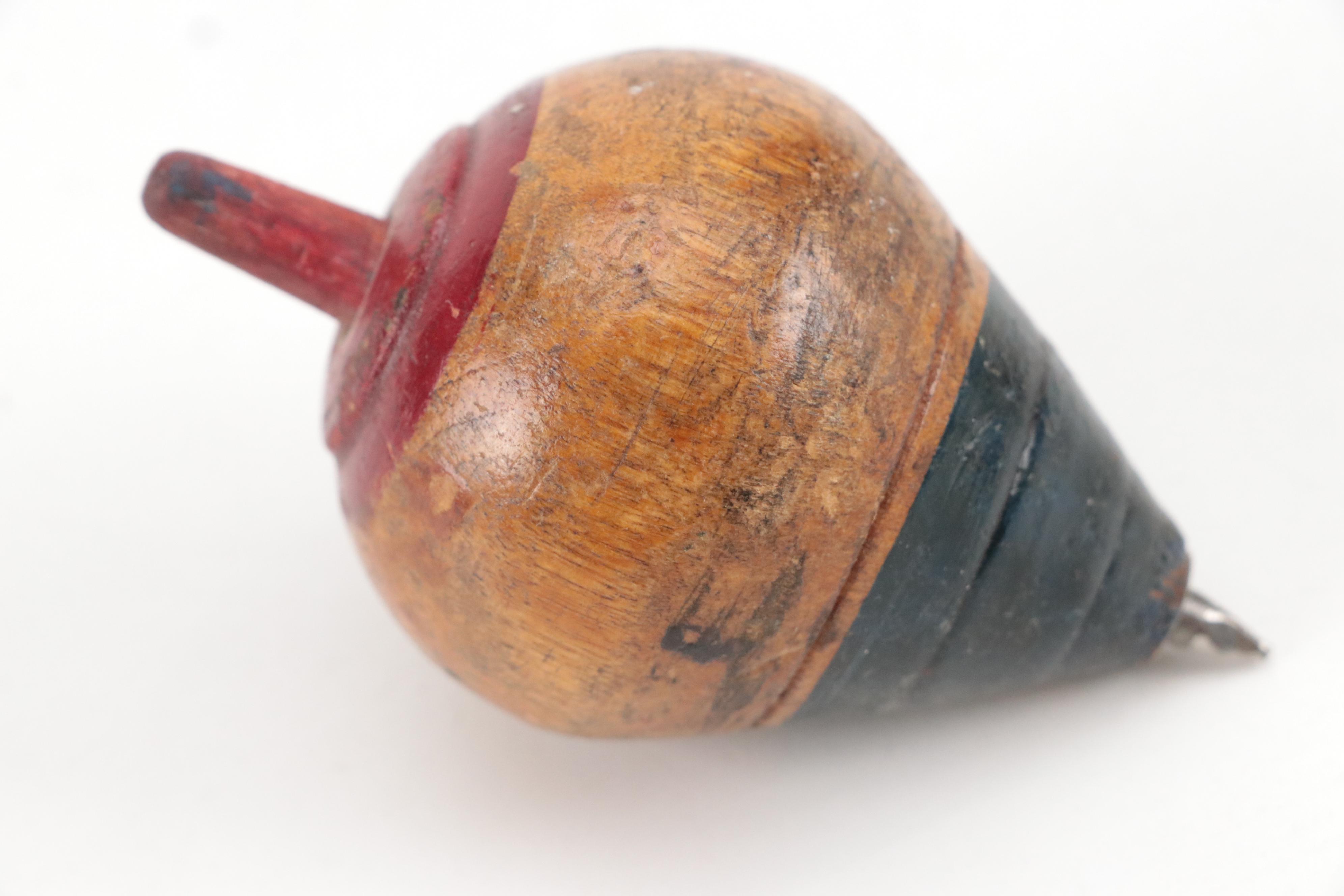 Turned Hand-Carved Spinning Top with Other Spinning Tops