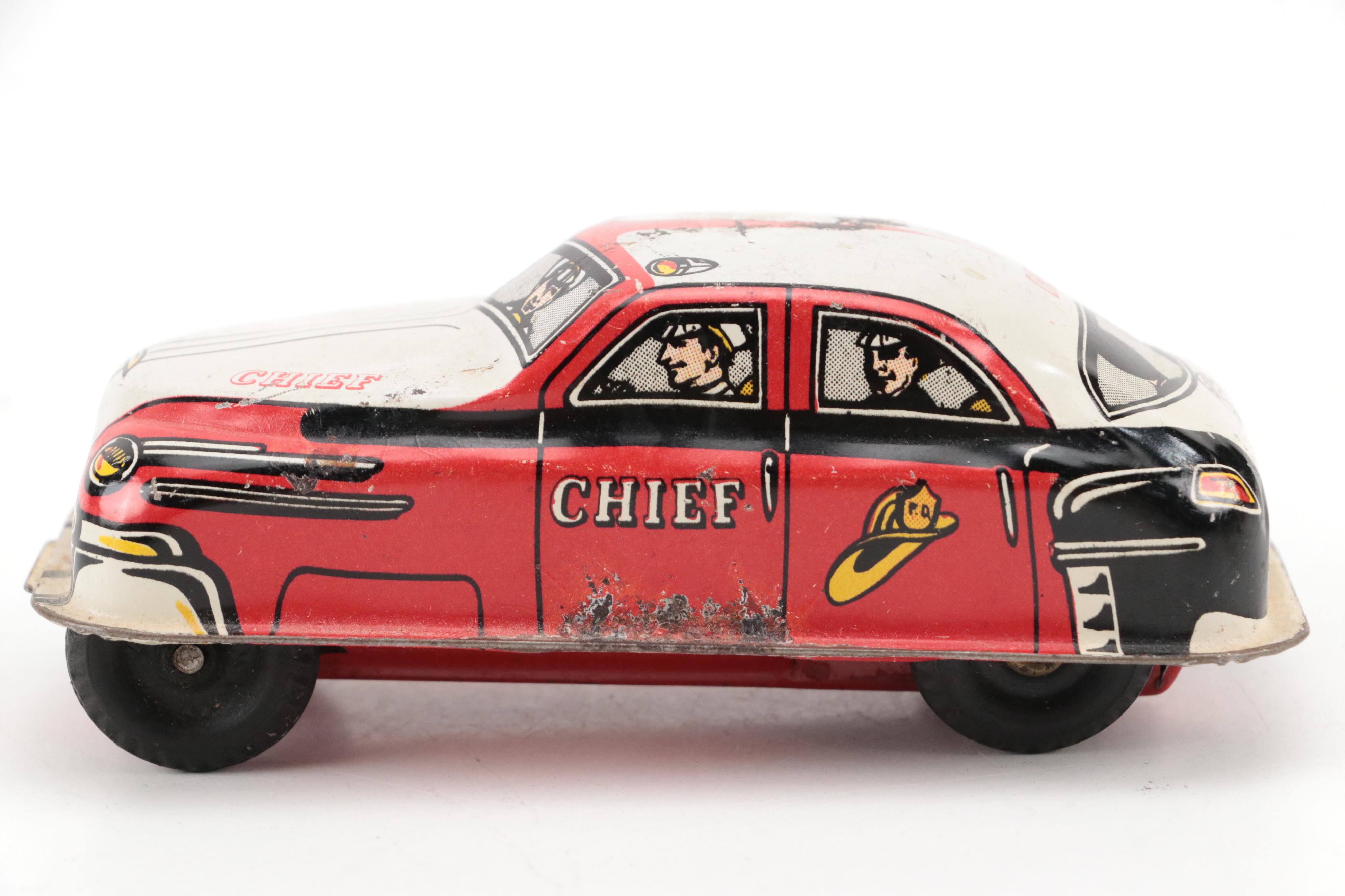 Lupor Tin Litho Perpetual Motion Police Chief Car with Other Tin Litho Cars