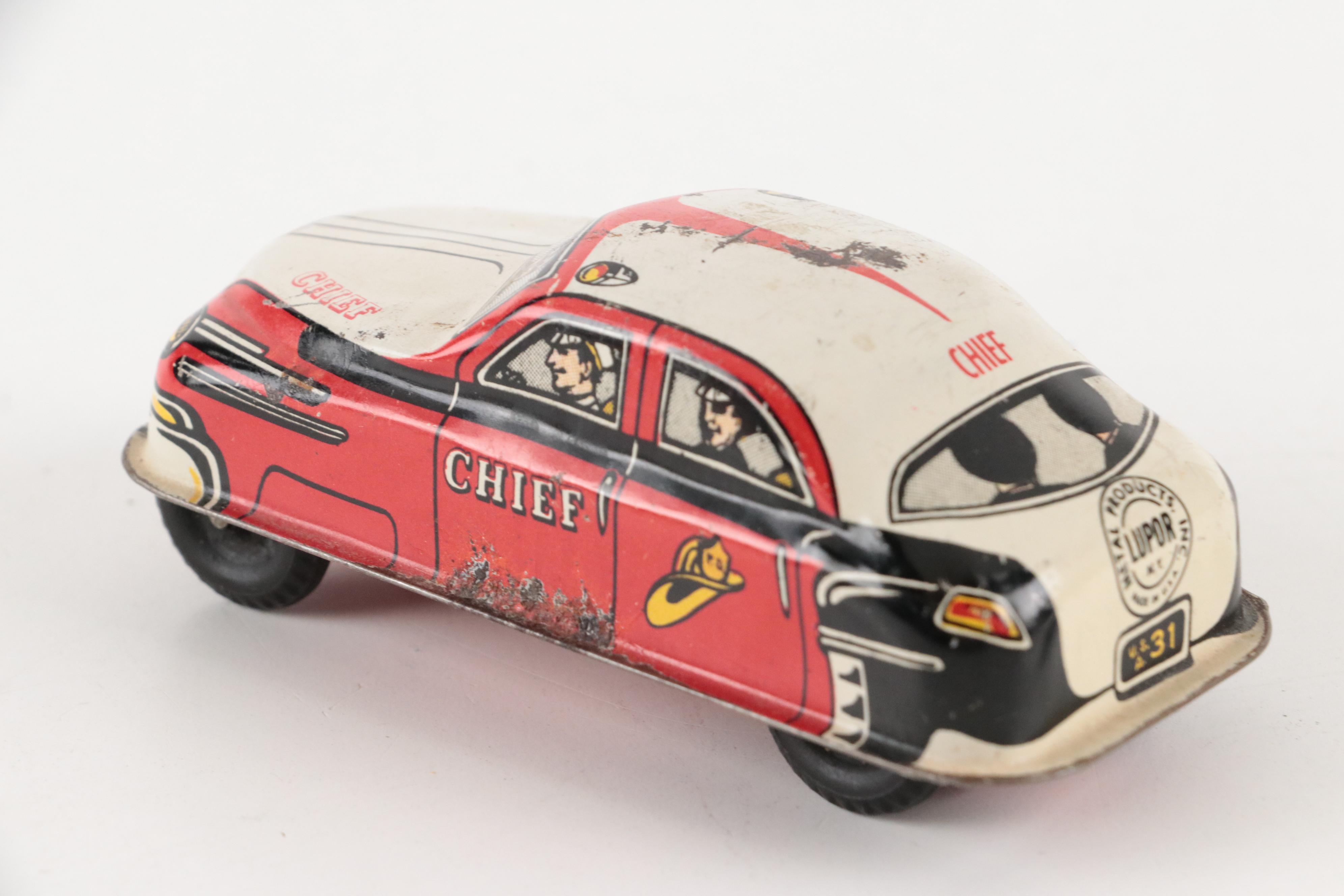Lupor Tin Litho Perpetual Motion Police Chief Car with Other Tin Litho Cars