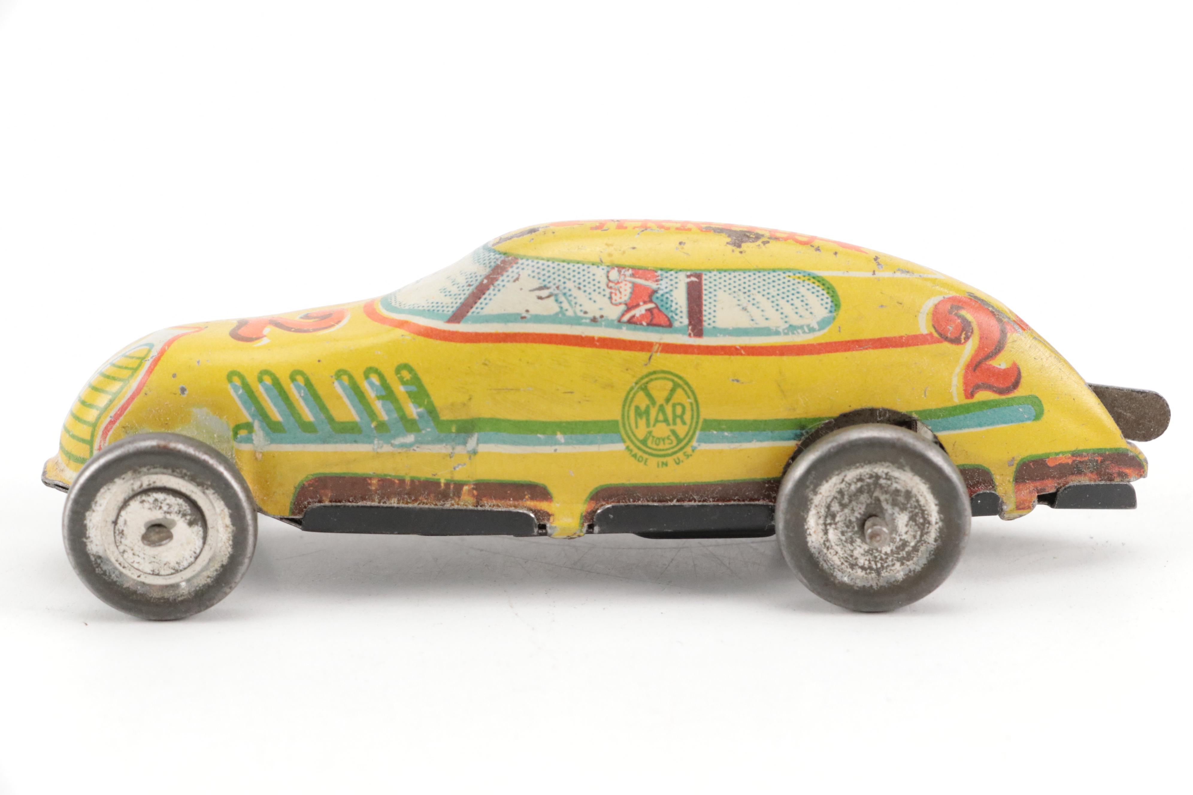 Lupor Tin Litho Perpetual Motion Police Chief Car with Other Tin Litho Cars