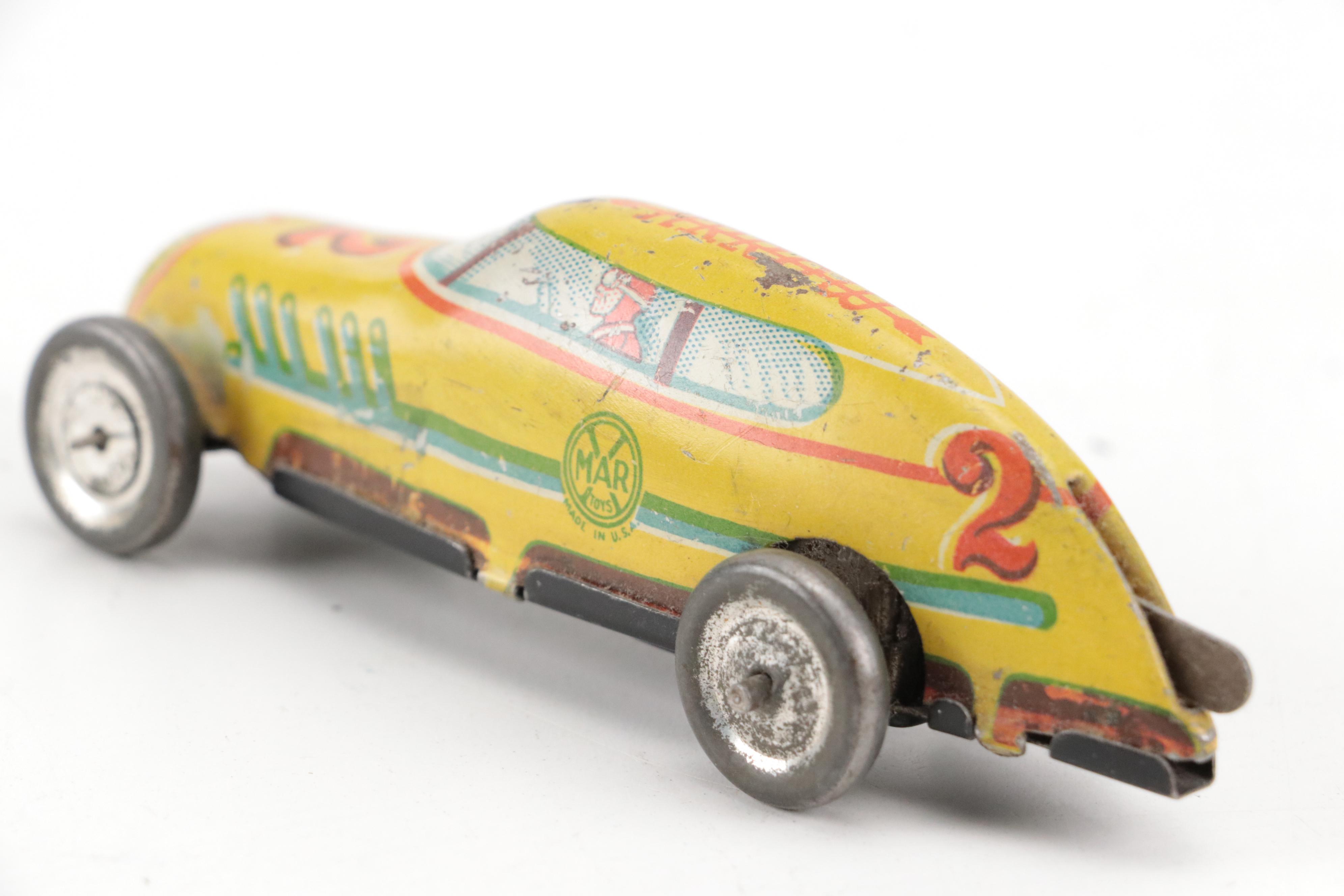 Lupor Tin Litho Perpetual Motion Police Chief Car with Other Tin Litho Cars