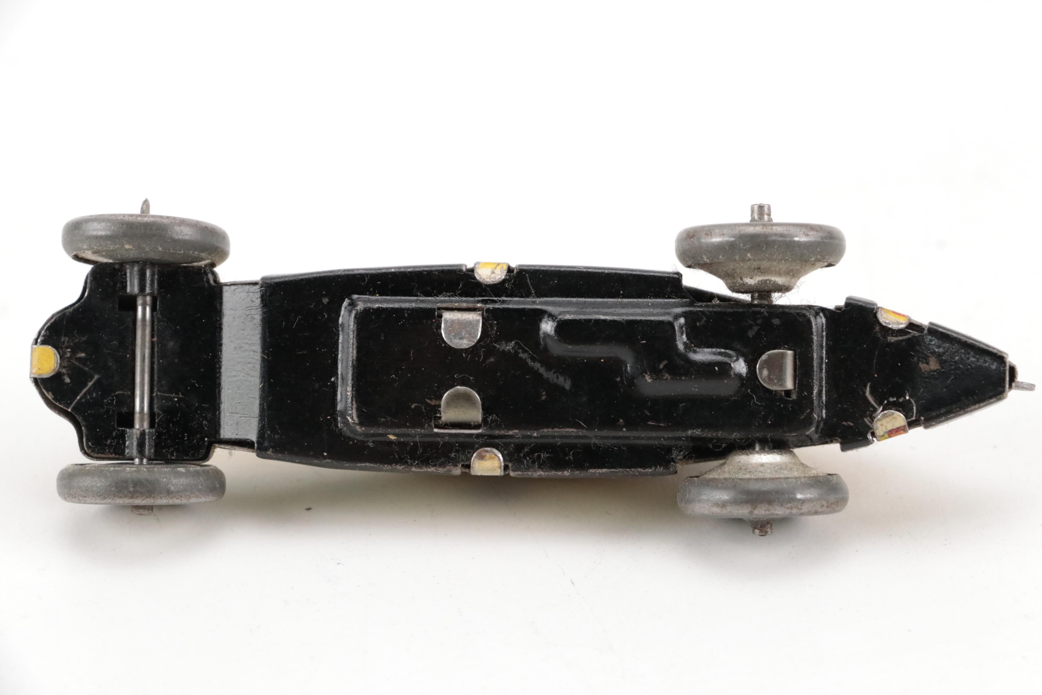 Lupor Tin Litho Perpetual Motion Police Chief Car with Other Tin Litho Cars