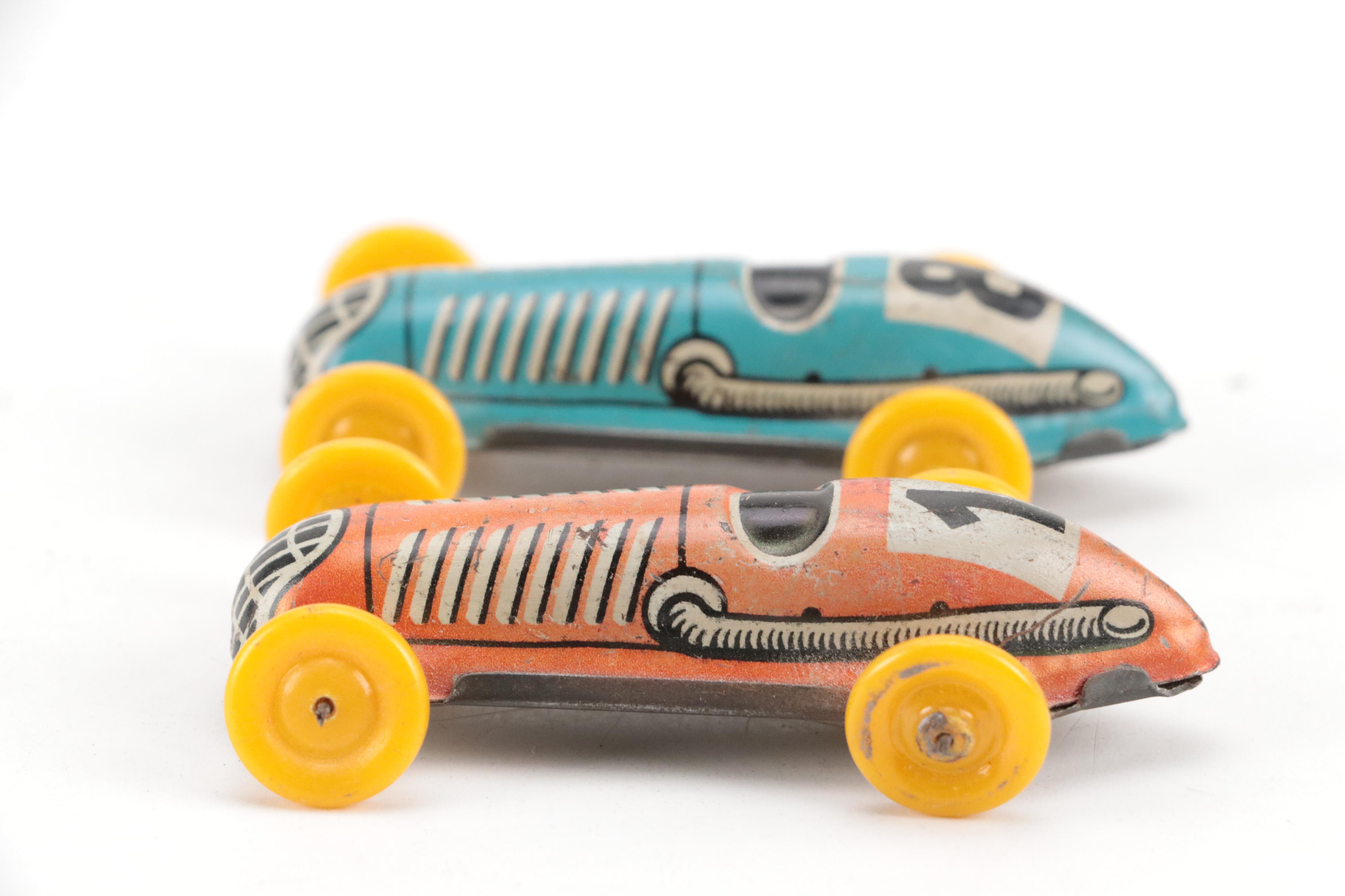 Lupor Tin Litho Perpetual Motion Police Chief Car with Other Tin Litho Cars