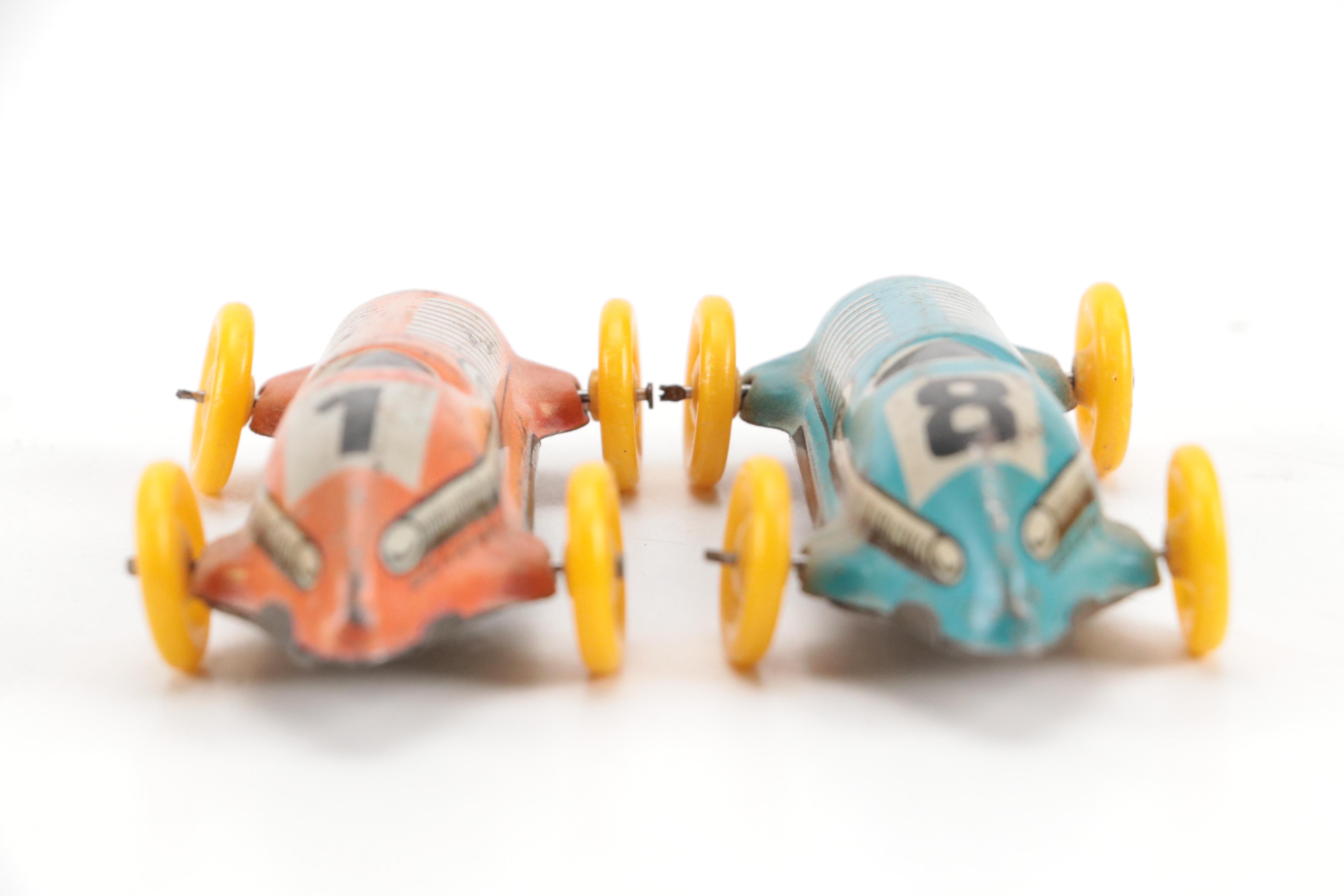 Lupor Tin Litho Perpetual Motion Police Chief Car with Other Tin Litho Cars