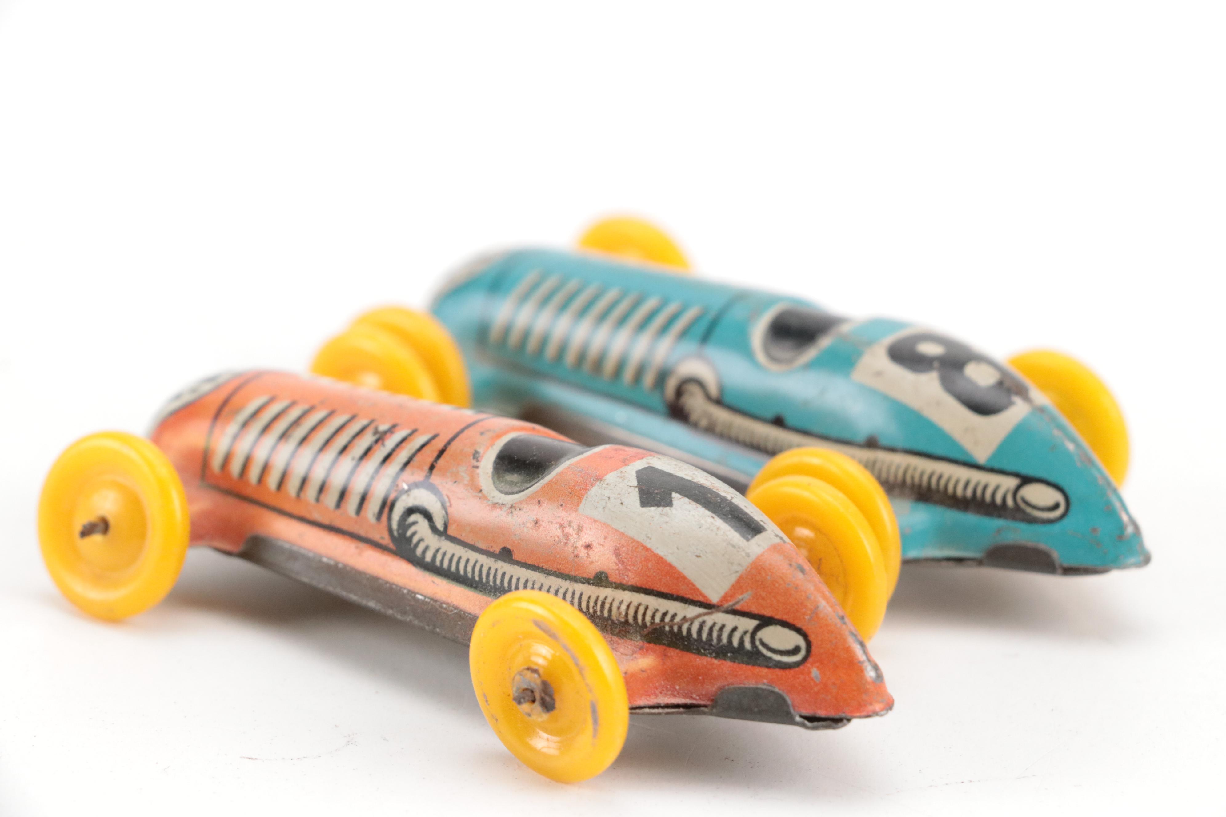 Lupor Tin Litho Perpetual Motion Police Chief Car with Other Tin Litho Cars