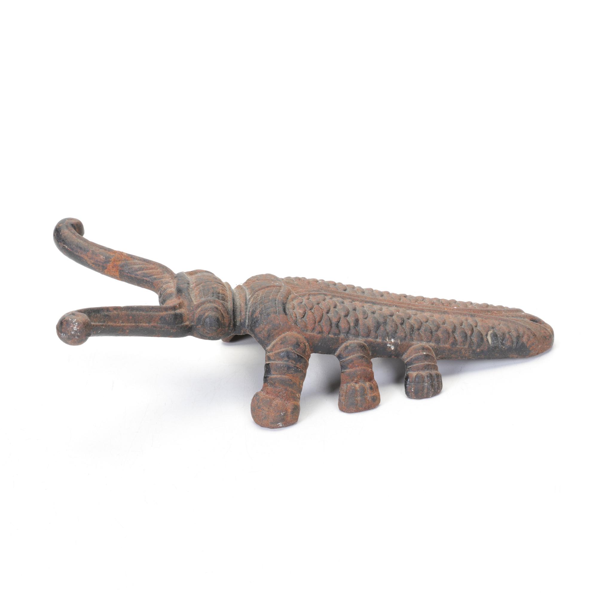 Cast Iron Bug Shaped Boot Jack with Welded Horseshoe Pumpkin