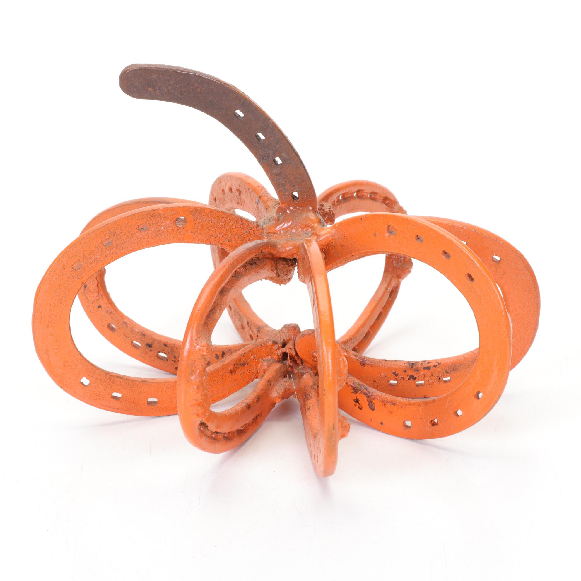 Cast Iron Bug Shaped Boot Jack with Welded Horseshoe Pumpkin