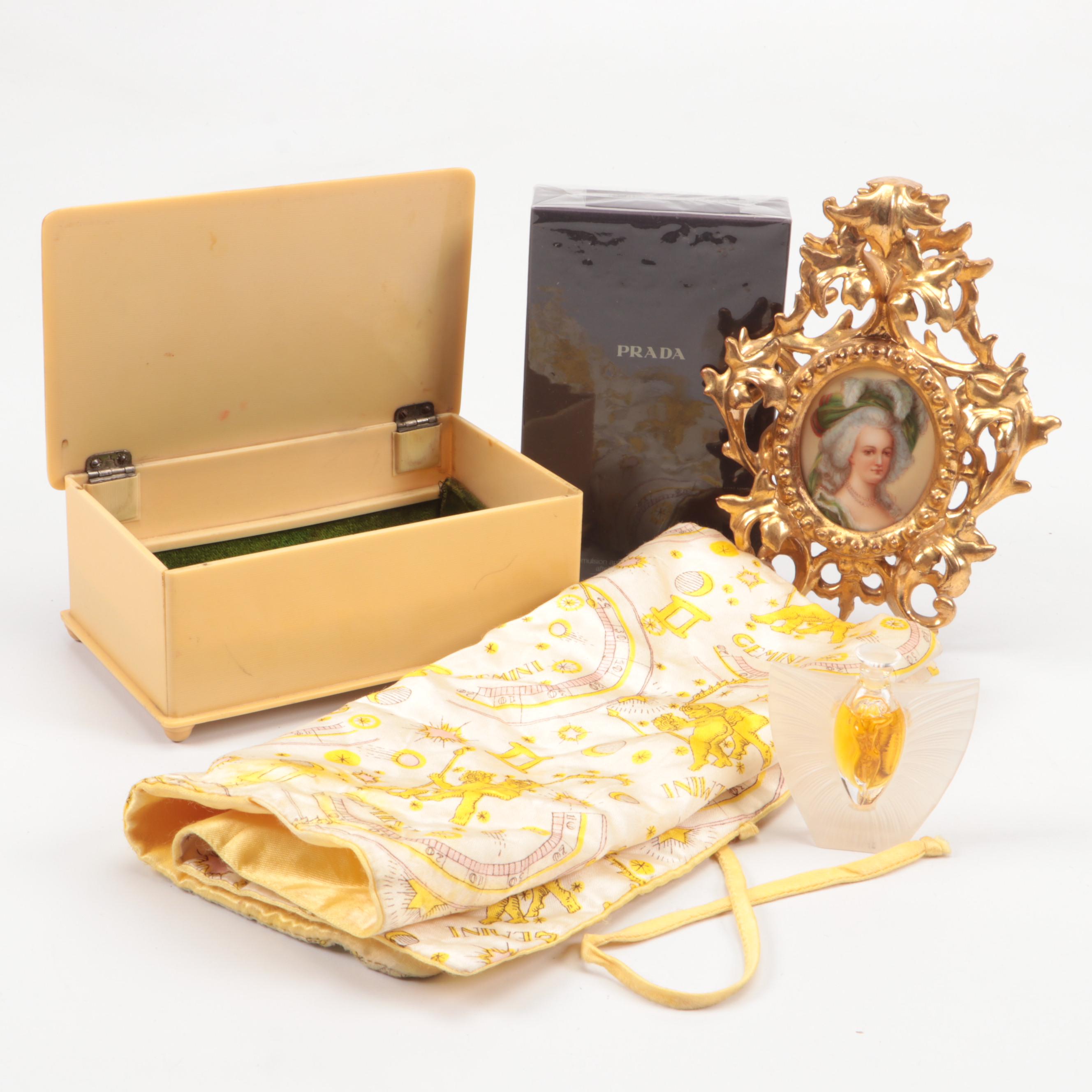 Prada and Lalique Perfume Bottles with Plaster Frame and More
