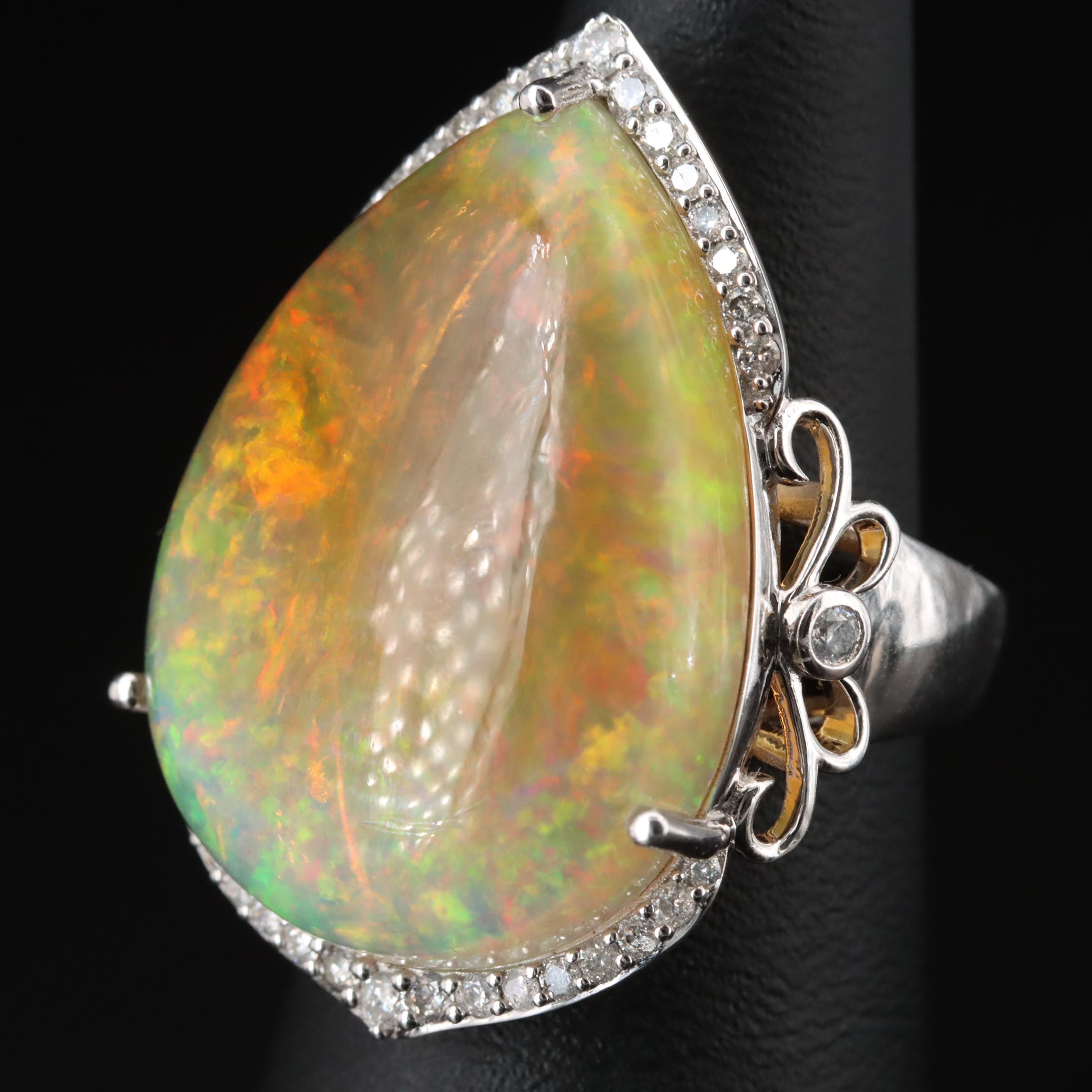 14K 20.90 CT Opal and 0.43 CTW Diamond Ring