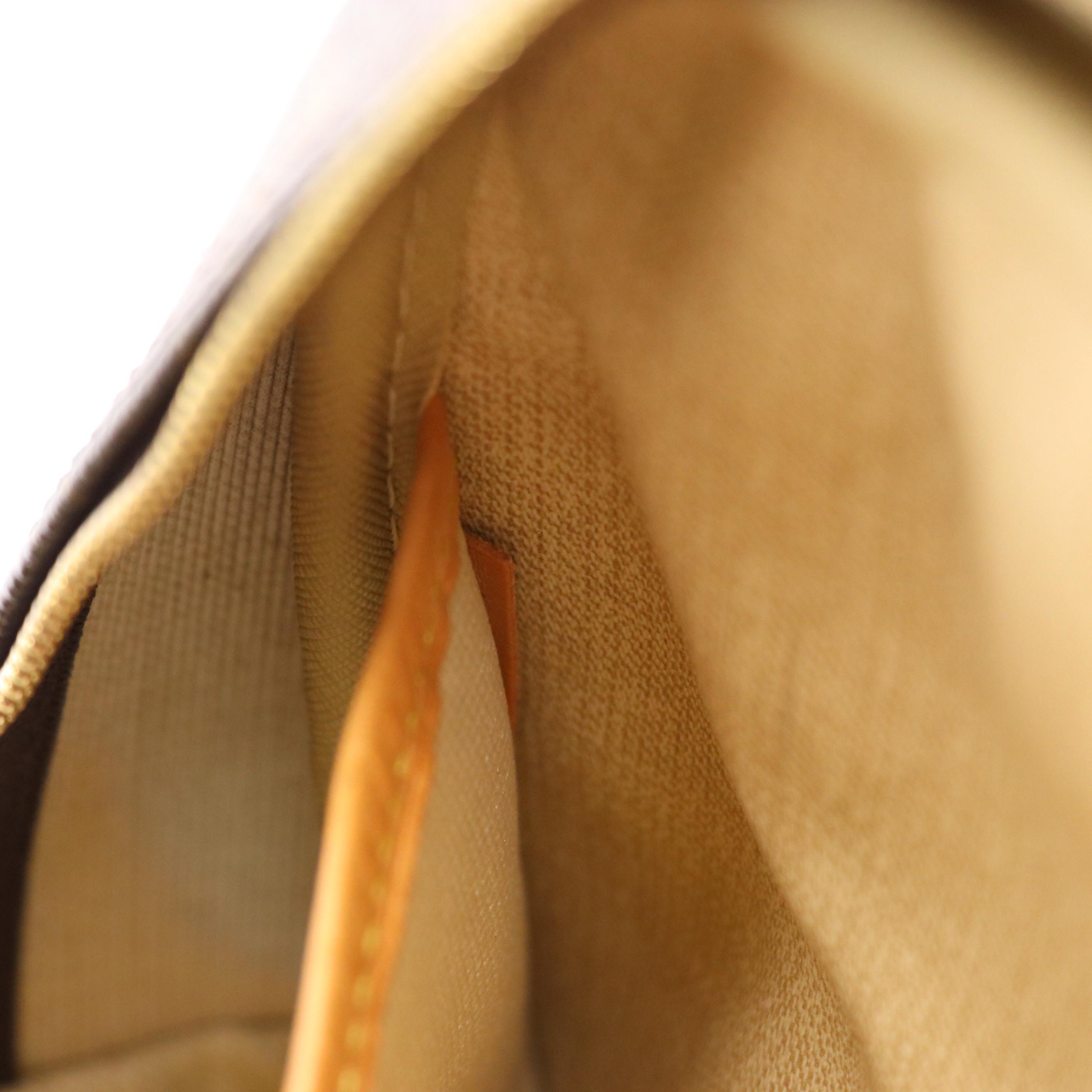 Louis Vuitton Trouville Travel Bag in Monogram Canvas and Vachetta Leather