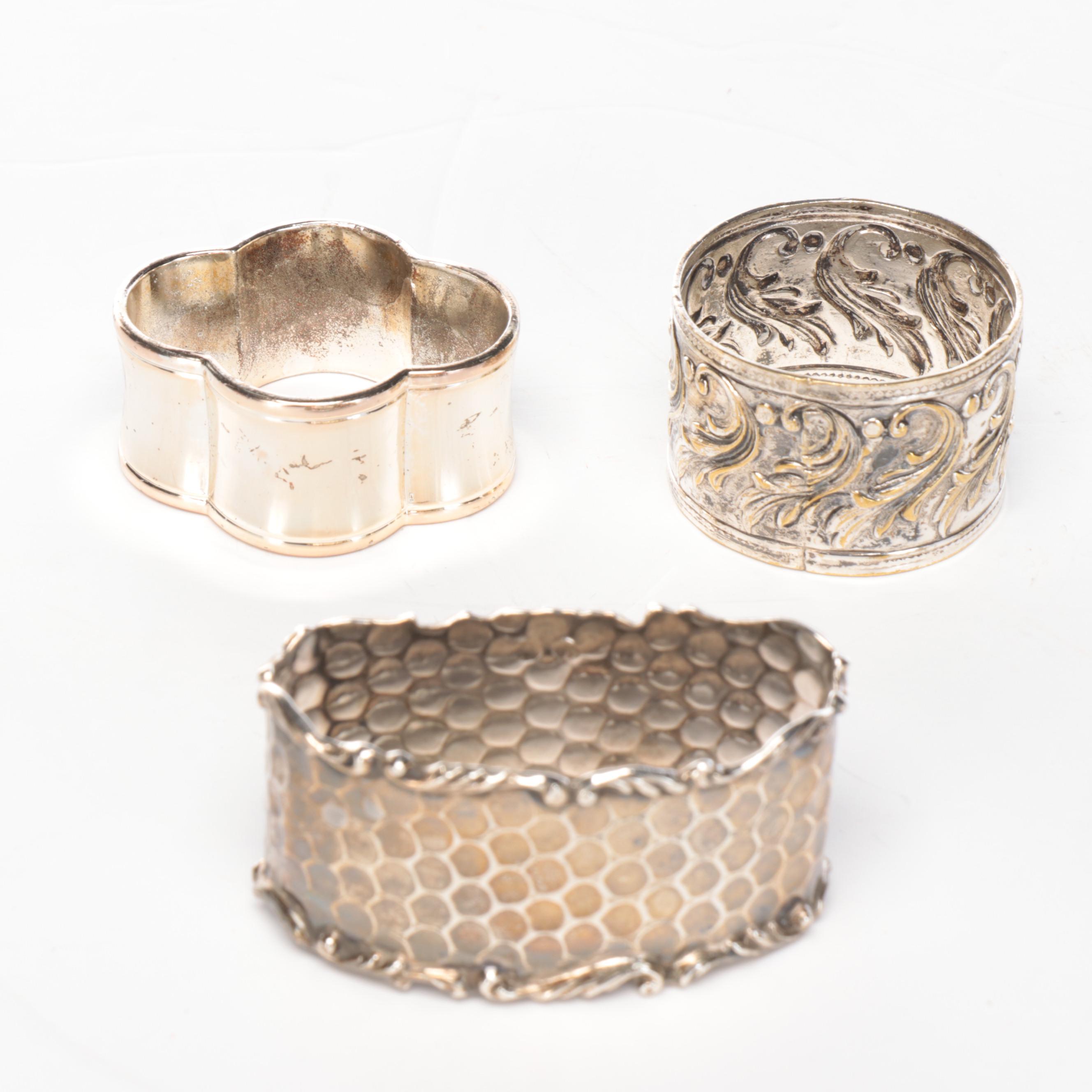 Wood Wall-Hanging Shelf with Silver Tone Metal Napkin Ring Collection and Vase