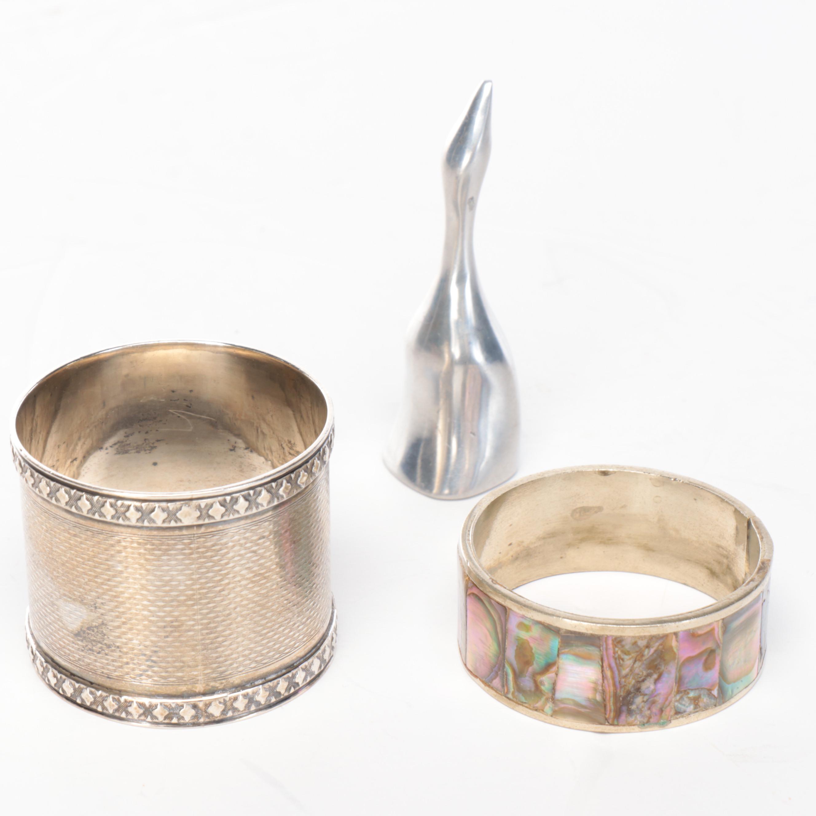 Wood Wall-Hanging Shelf with Silver Tone Metal Napkin Ring Collection and Vase