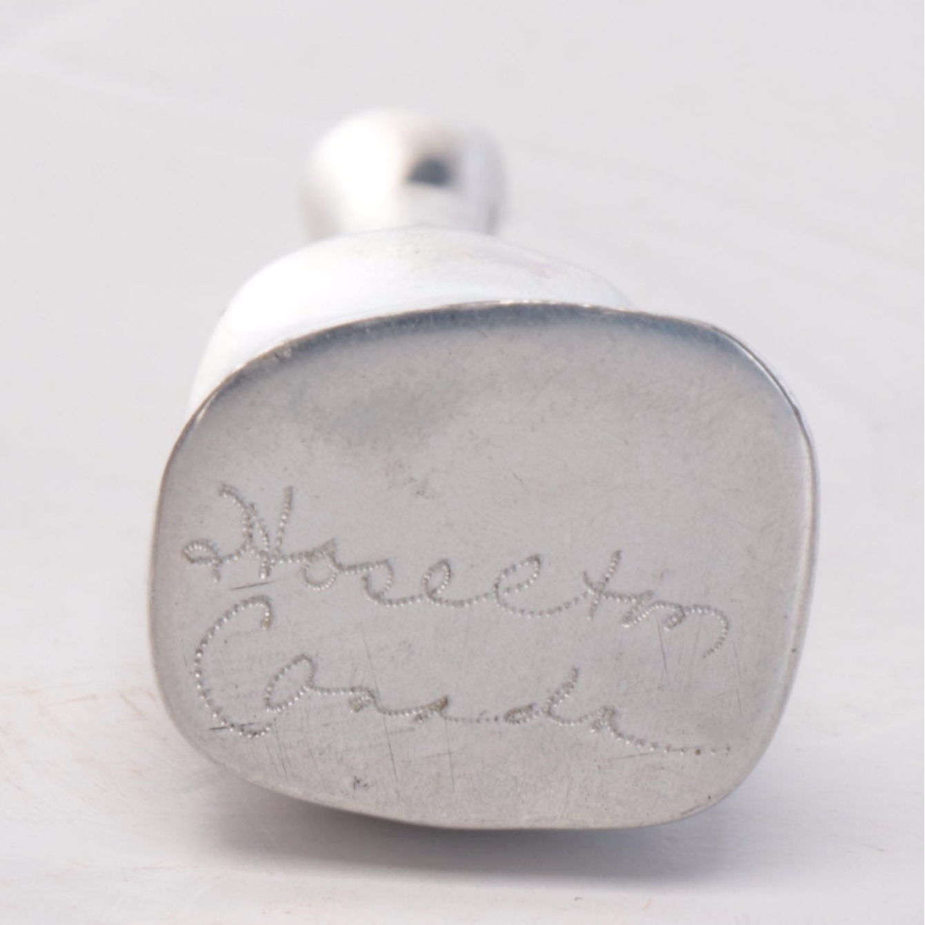 Wood Wall-Hanging Shelf with Silver Tone Metal Napkin Ring Collection and Vase