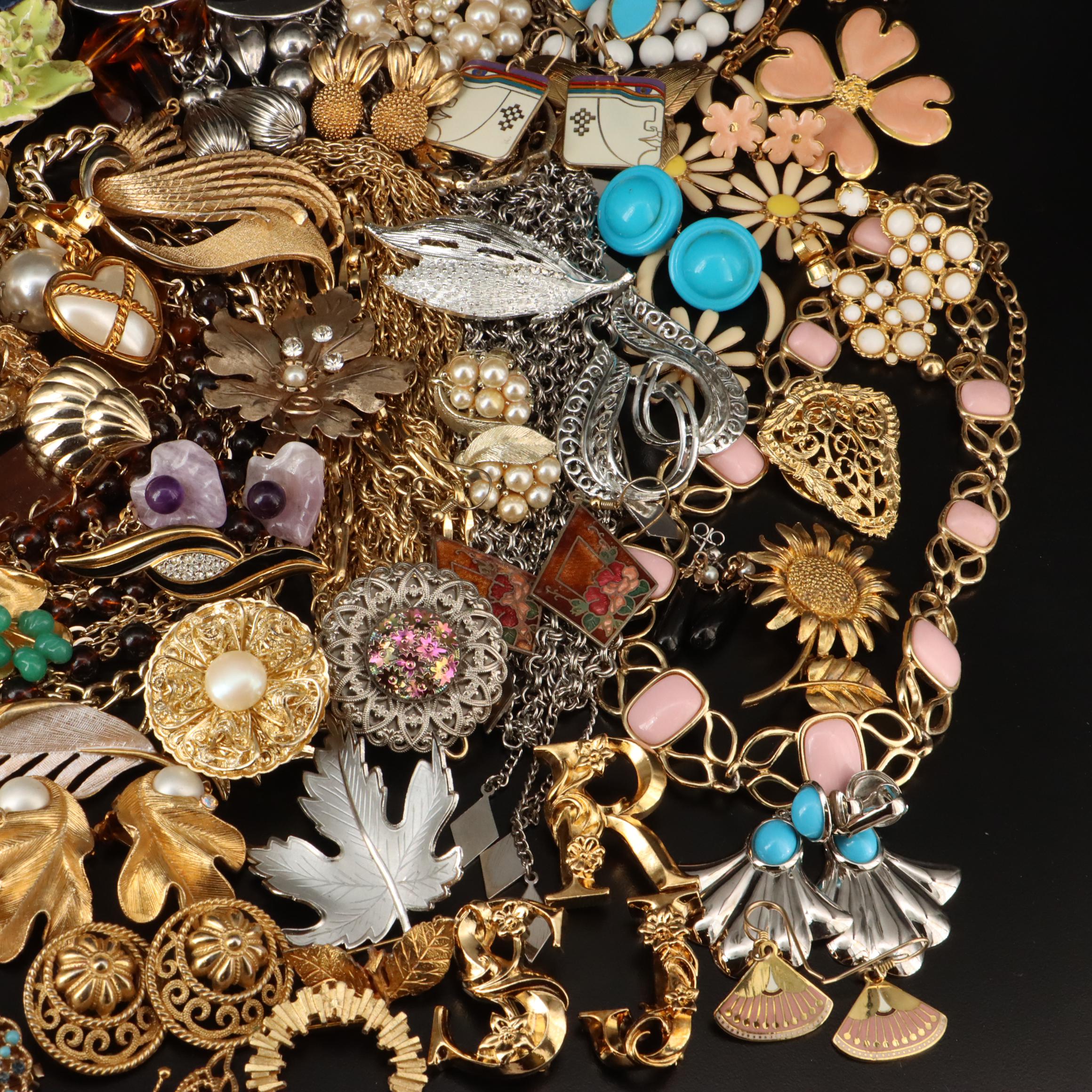 Collection of Costume Jewelry Featuring Zodiac Pendant Necklaces