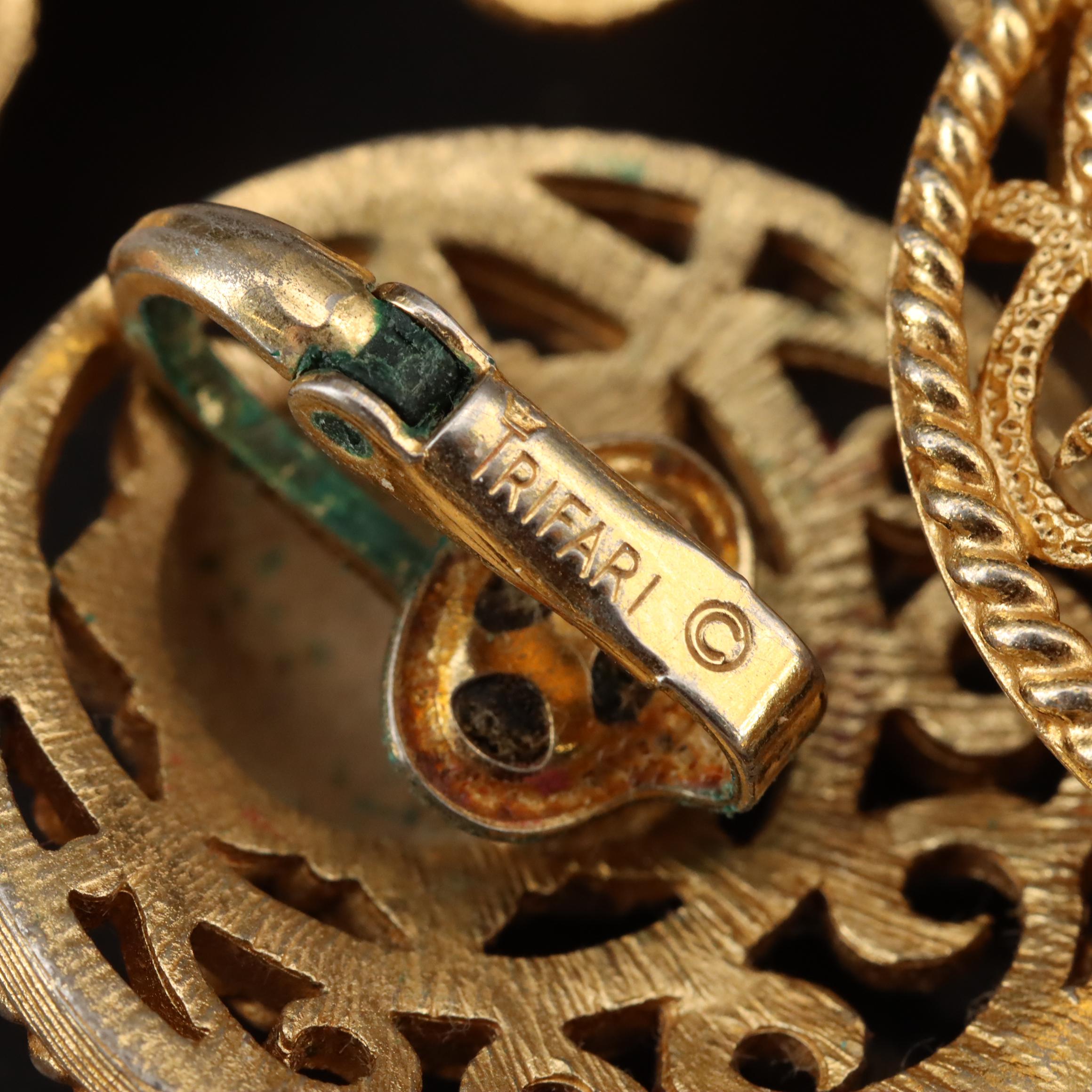 Collection of Costume Jewelry Featuring Zodiac Pendant Necklaces