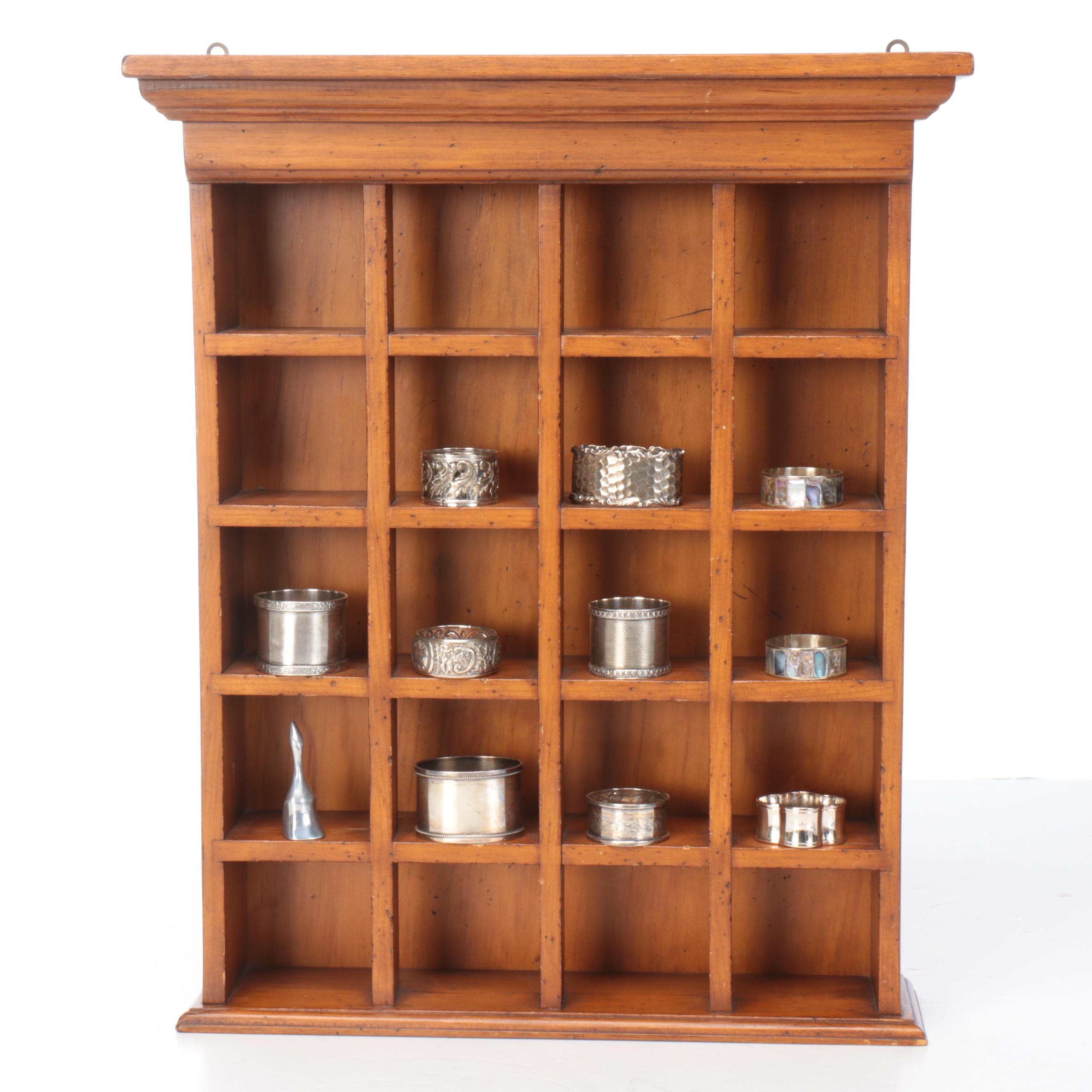 Wood Wall-Hanging Shelf with Silver Tone Metal Napkin Ring Collection and Vase