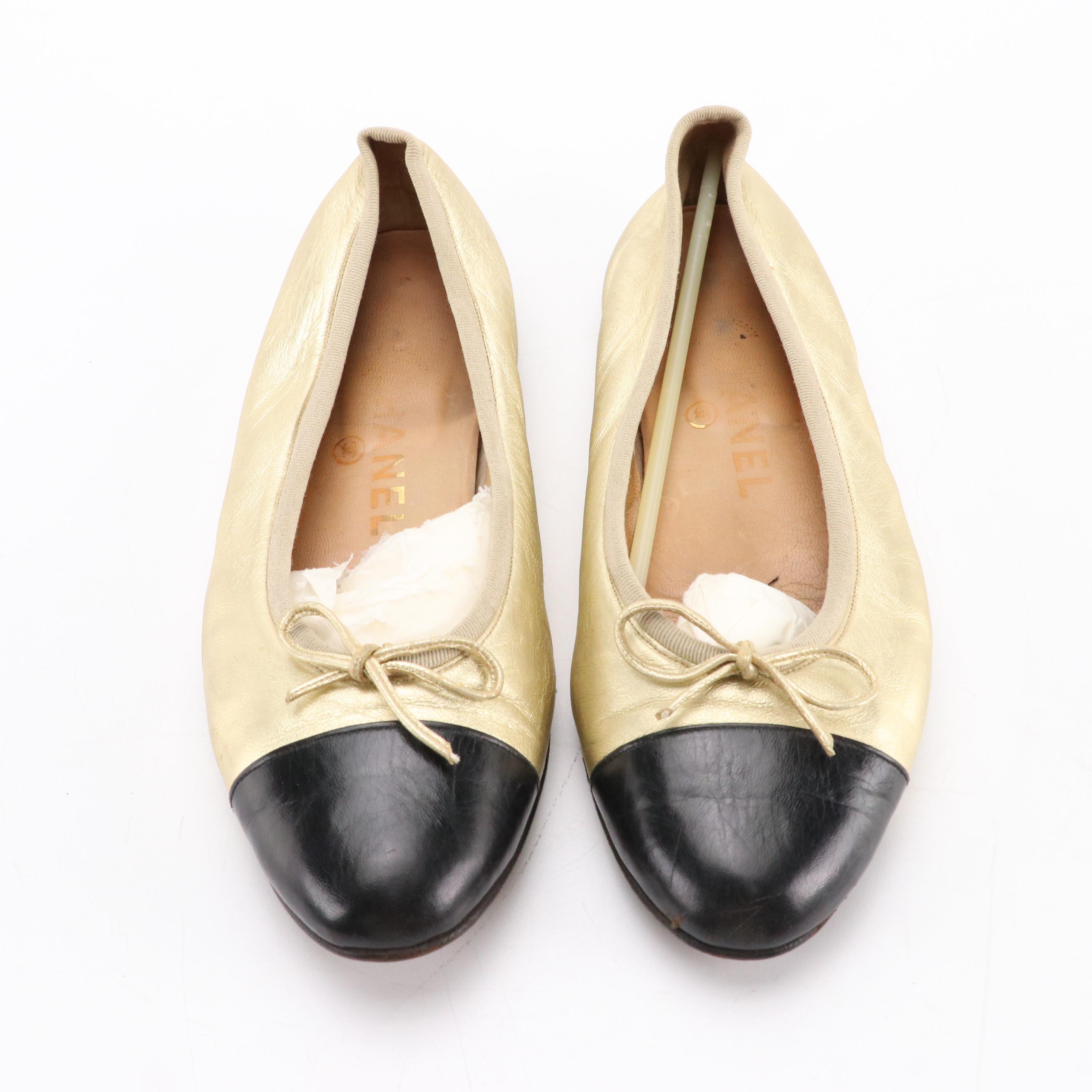 Chanel Cap Toe Bow Ballet Flats in Black and Metallic Gold Leather