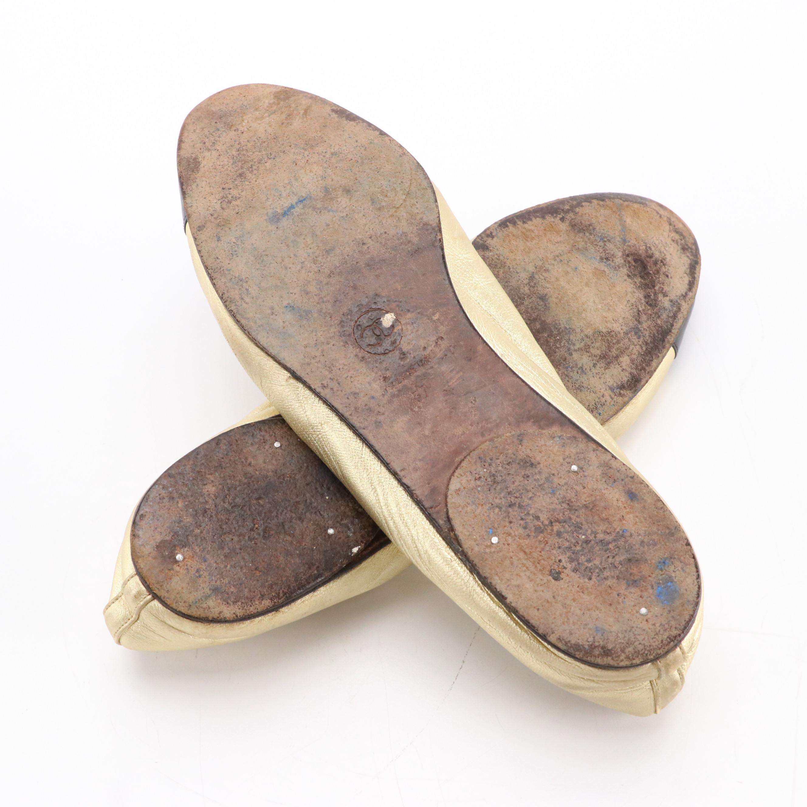 Chanel Cap Toe Bow Ballet Flats in Black and Metallic Gold Leather