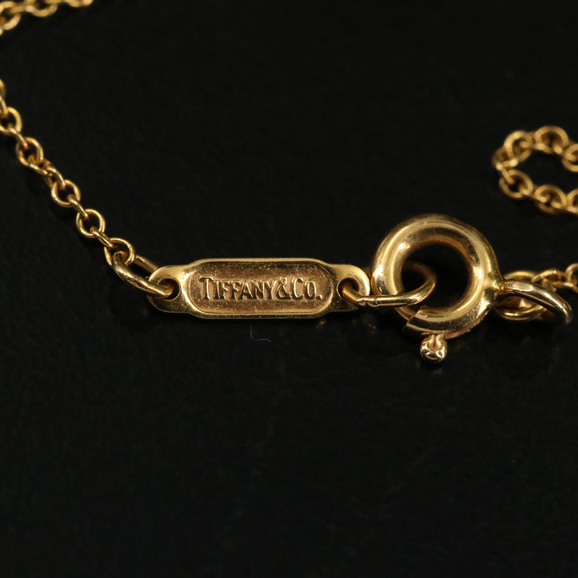 Tiffany & Co. 18K Cross Pendant Necklace