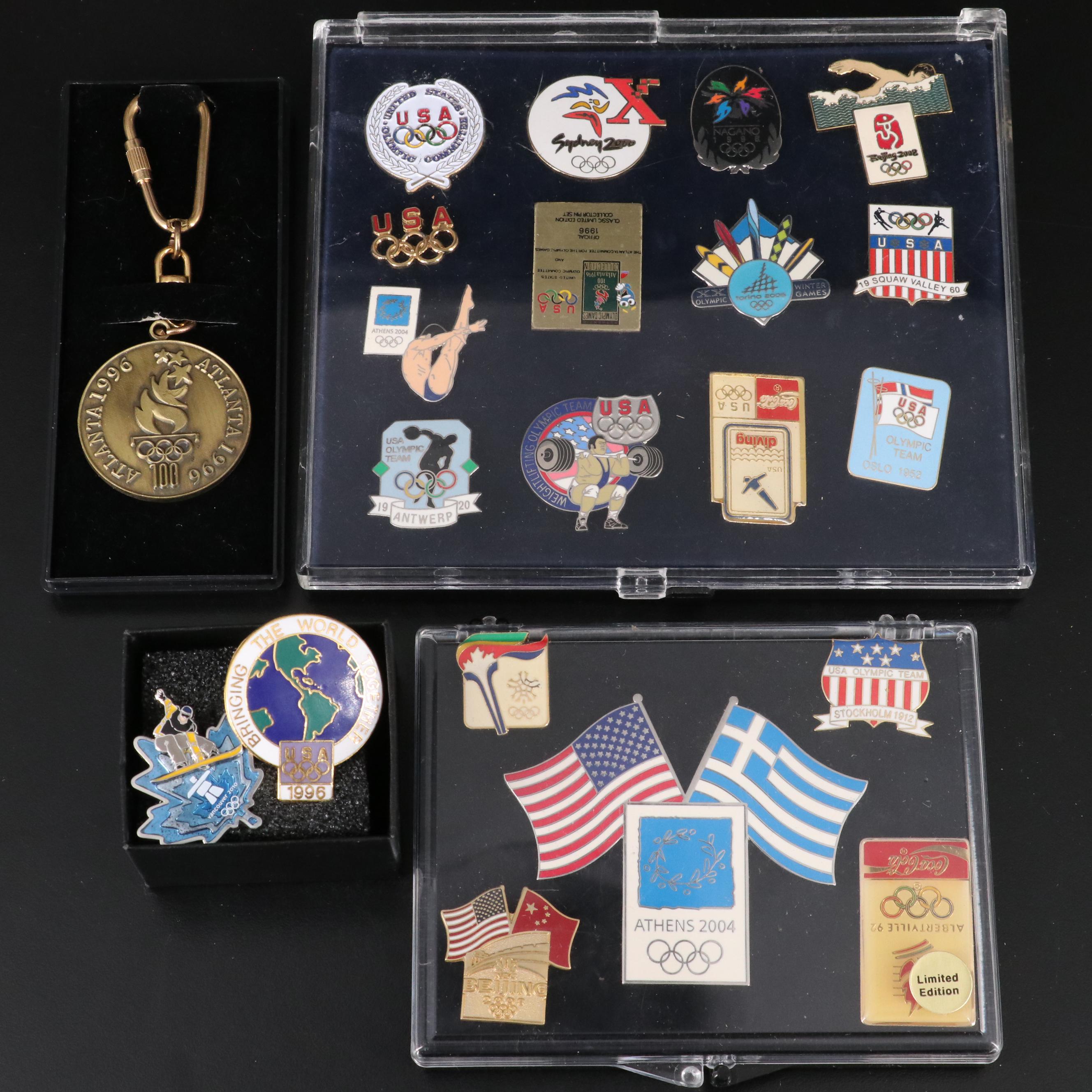Twenty Commemorative Olympic Pins and a Commemorative Medal
