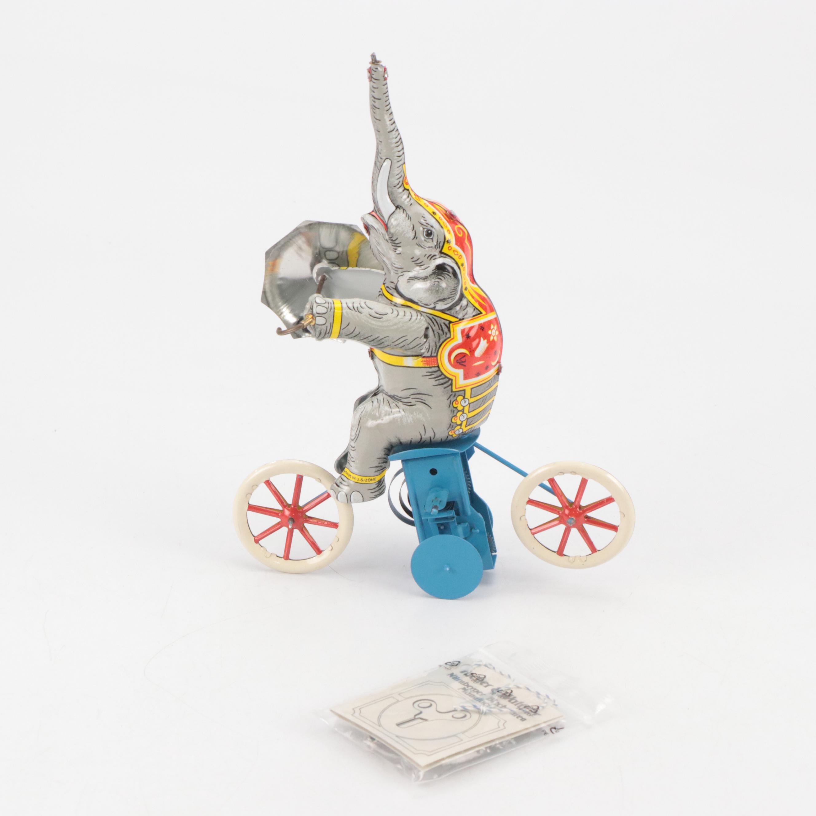 Clockwork Wind-Up Motorcycle with Sidecar and Other Tin Litho Toys, Vintage