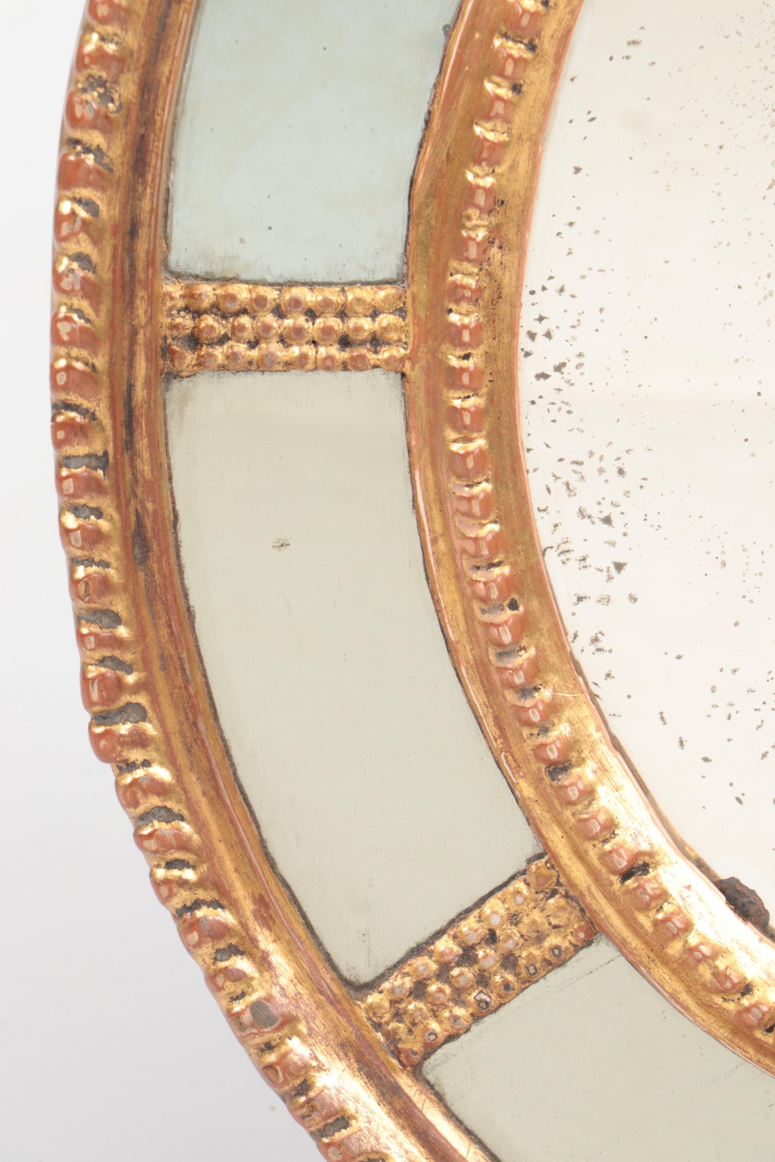 Adams Style Giltwood Oval Wall Mirror, Early 19th Century